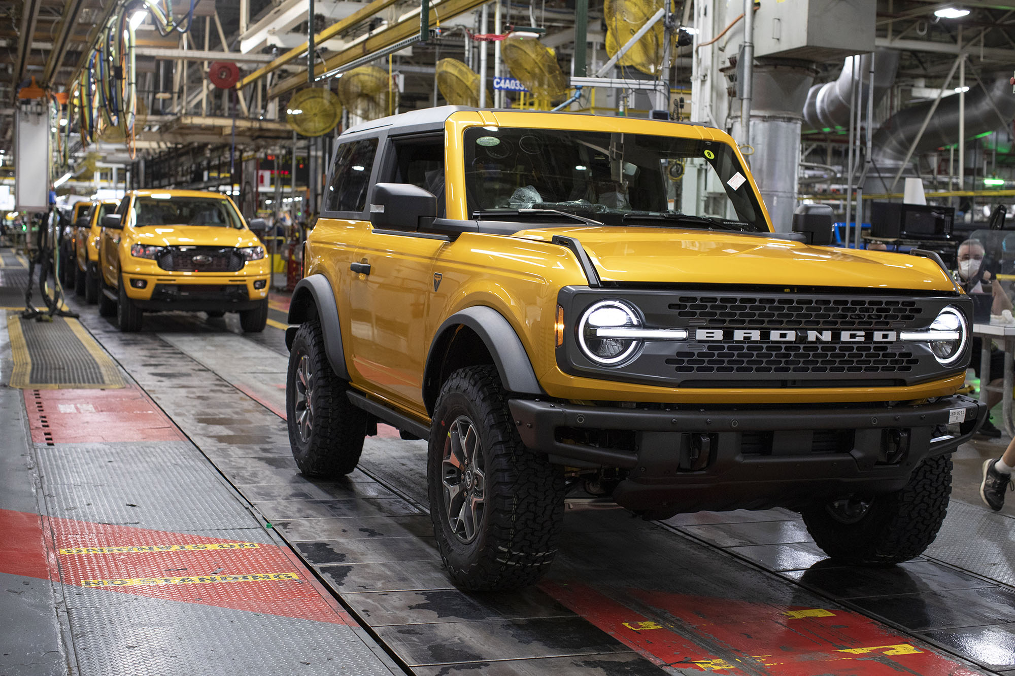 Yellow Ford Bronco on the production line.