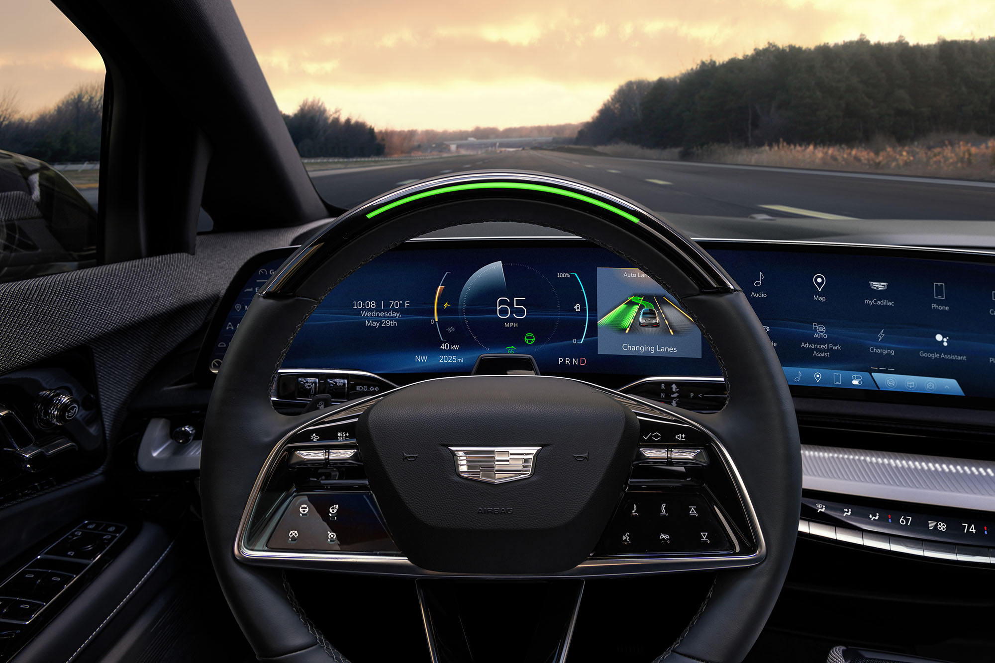 Cadillac steering wheel with LED bar lit up in green with Super Cruise activated