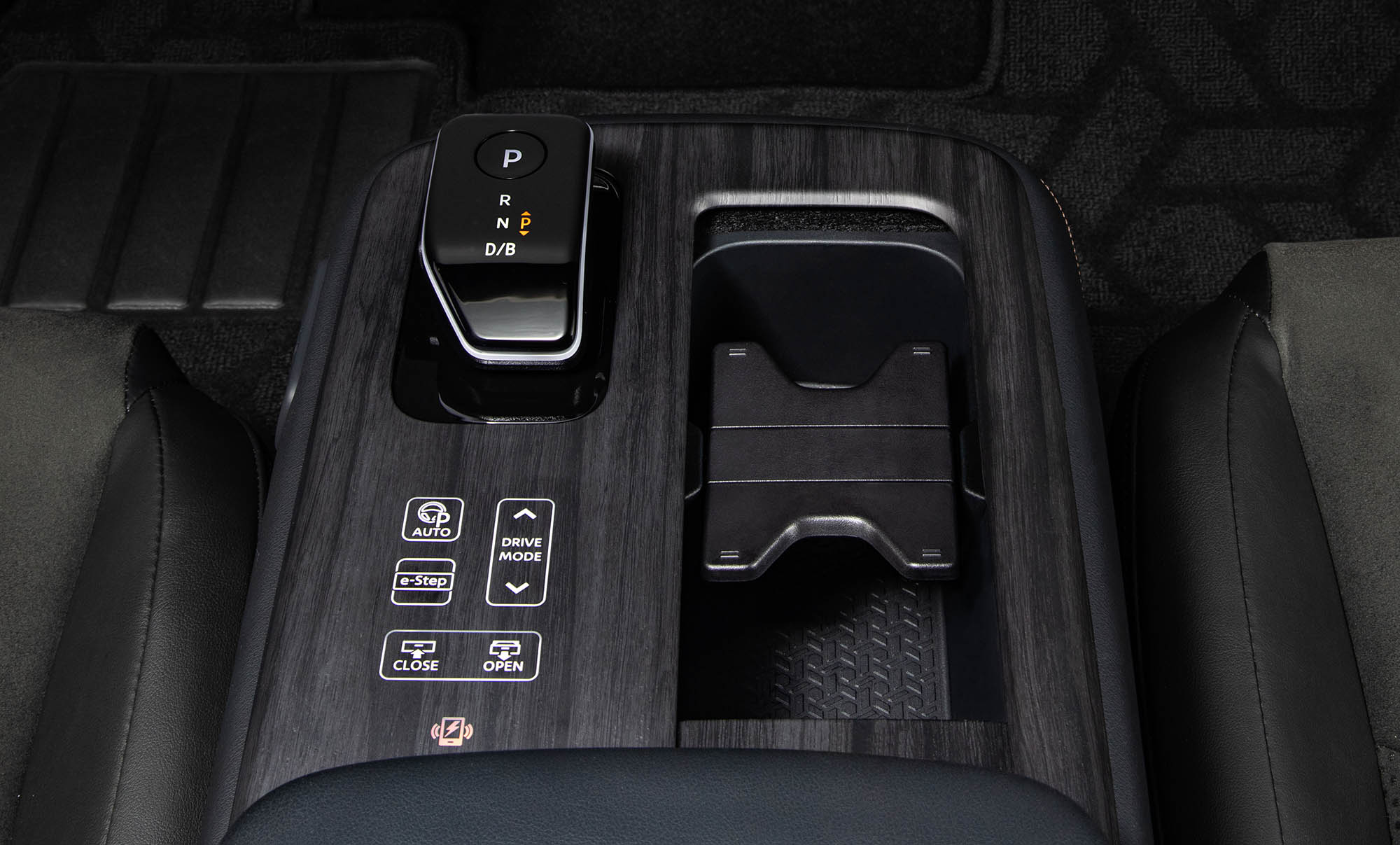 Nissan Ariya electric vehicle center console, shifter, and drive mode selector.