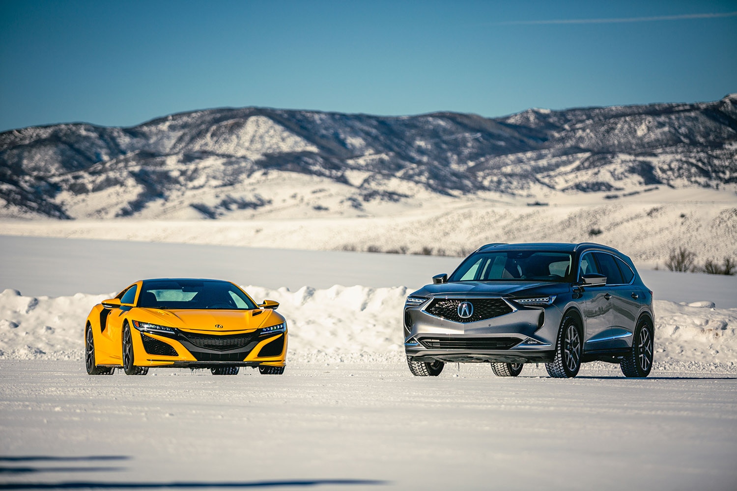 Acura NSX with Acura MDX Parked on Snow in Colorado