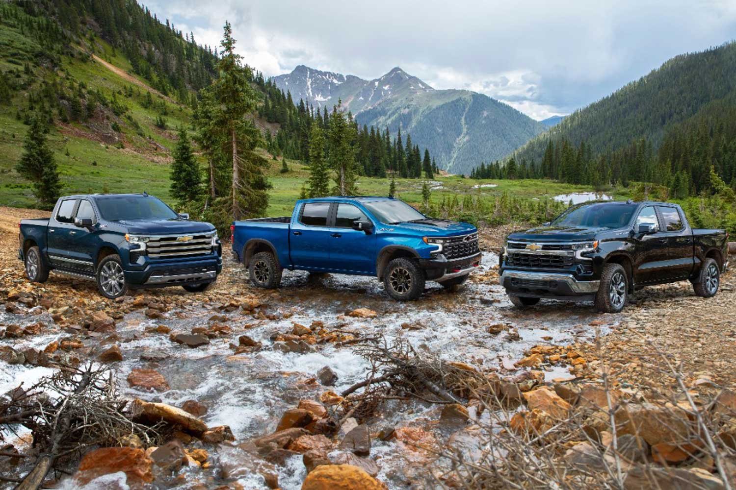 2022 Chevrolet Silverado High Country, ZR2, and LT models in blue