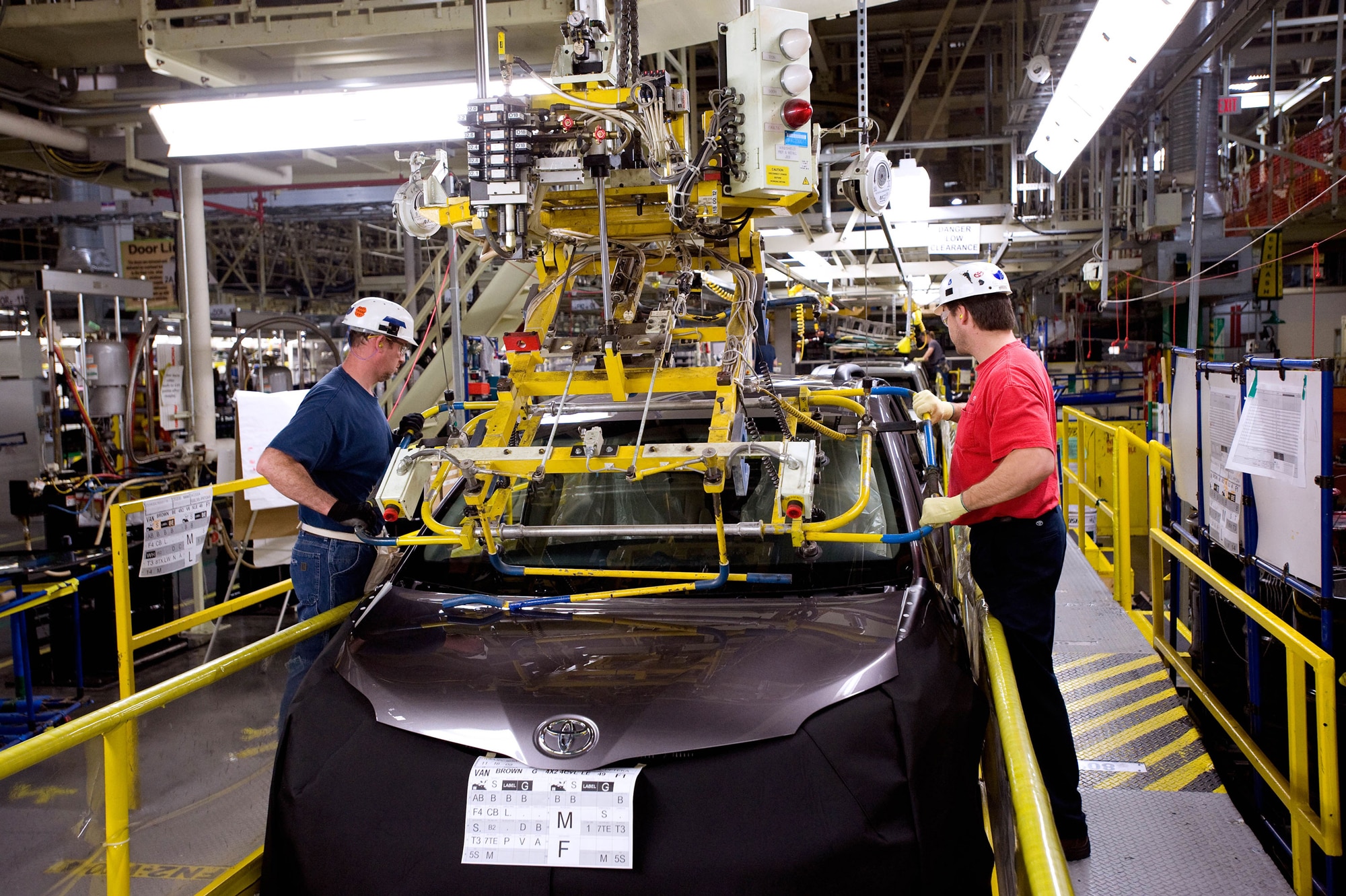 Windshield being installed in Toyota plant