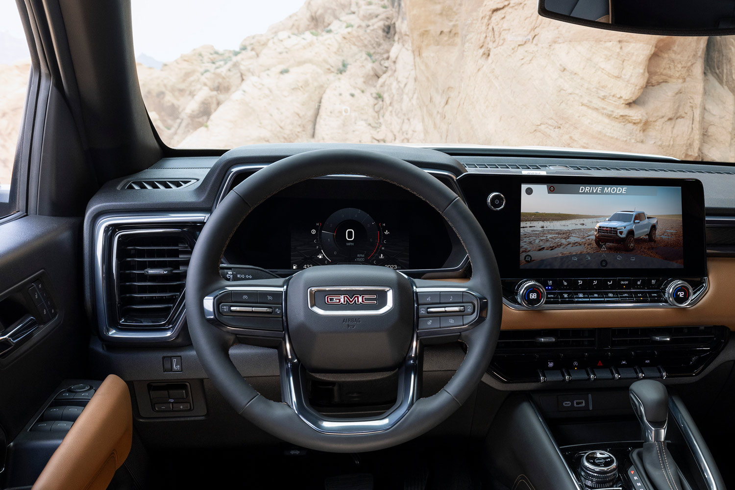 2023 GMC Canyon steering wheel and infotainment screen