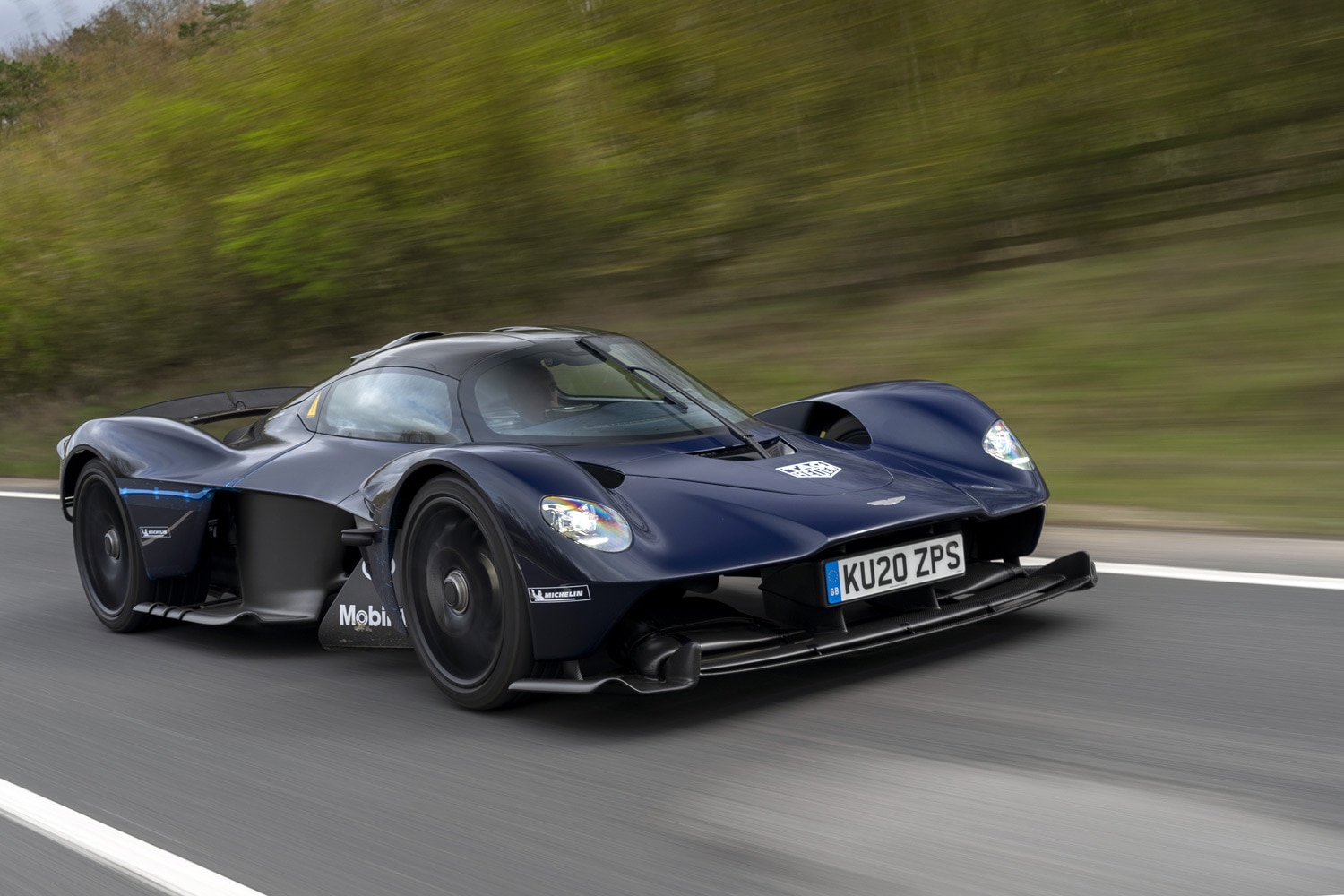 Aston Martin Valkyrie on road driving