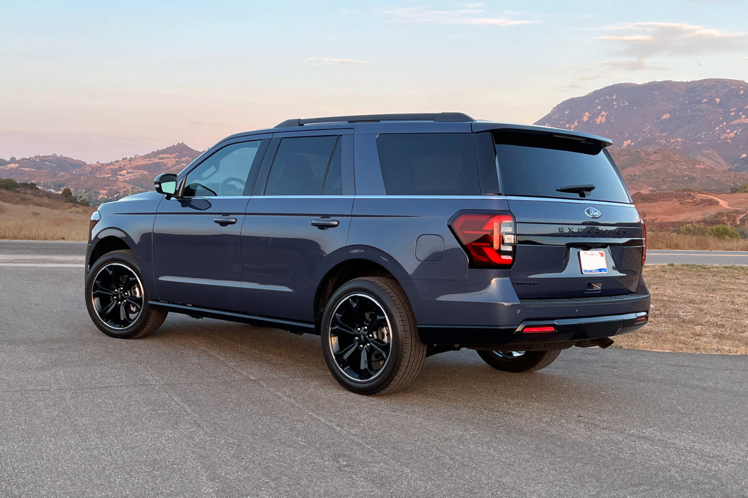2022 Ford Expedition Limited, Stealth Blue, rear-quarter left