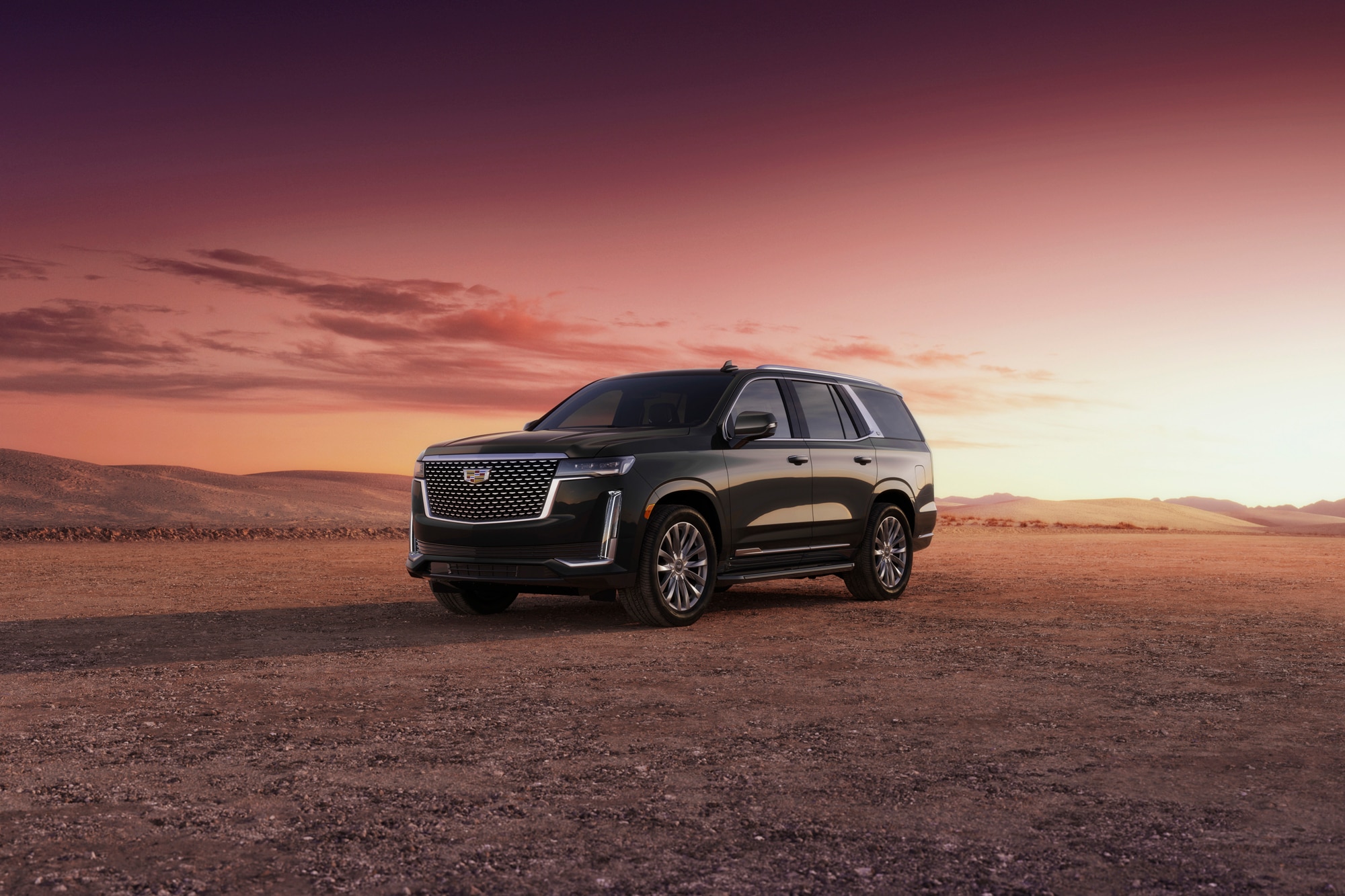 2023 Cadillac Escalade parked in desert at sunset
