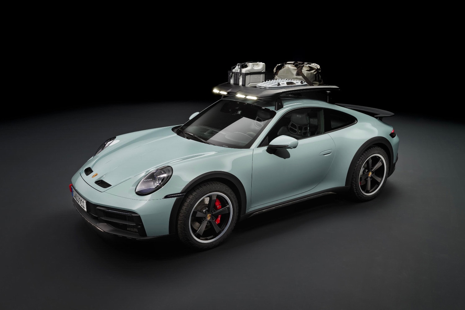 2023 Porsche 911 Dakar, Shade Green, front-quarter view, optional roof rack
