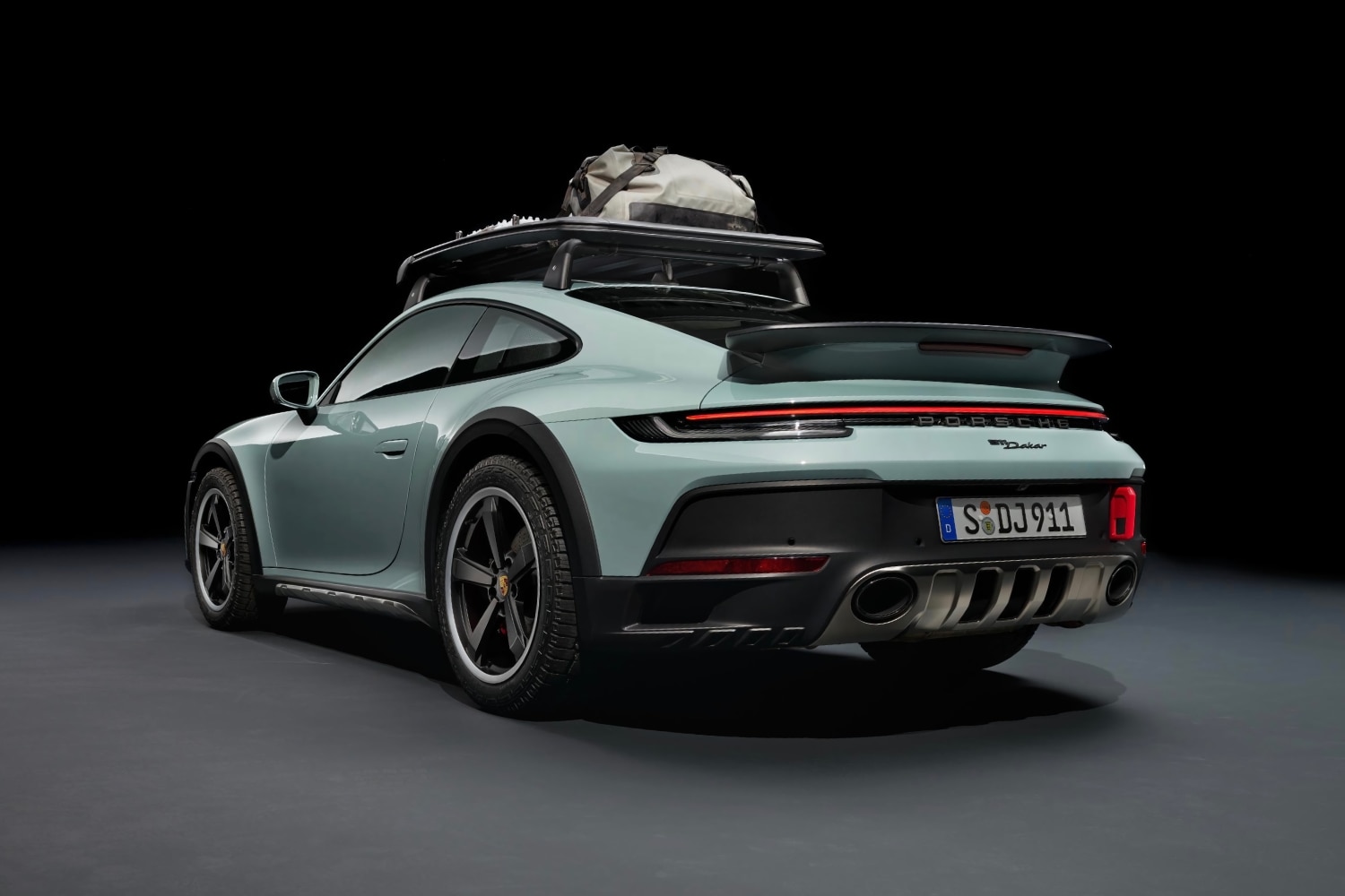 2023 Porsche 911 Dakar, Shade Green, rear-quarter view