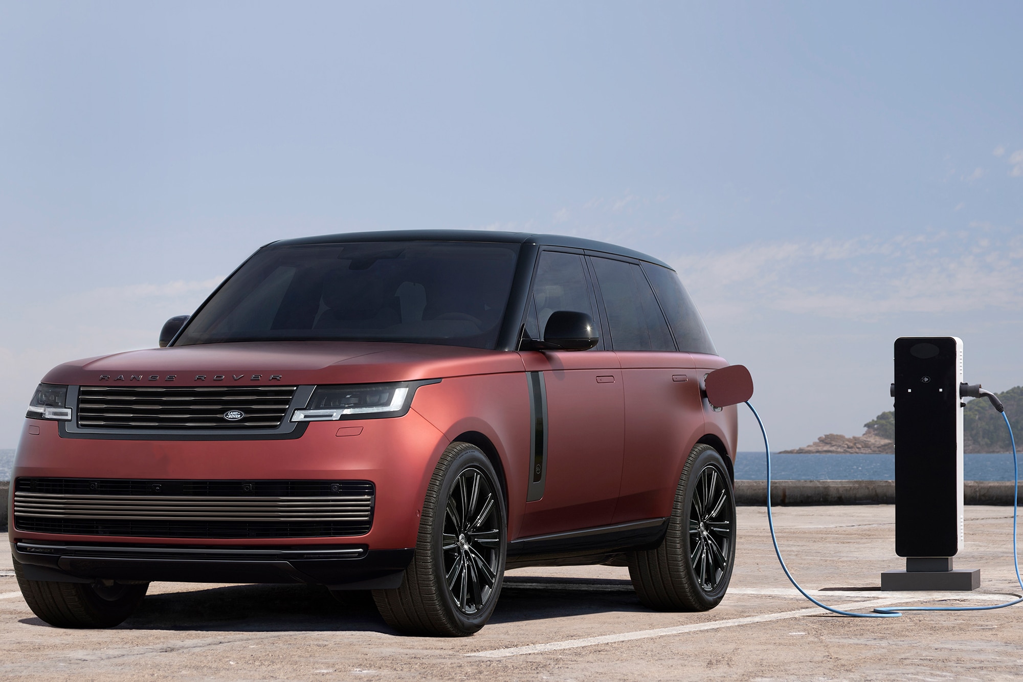 2022 Land Rover Range Rover SV Intrepid PHEV at charging station by the ocean