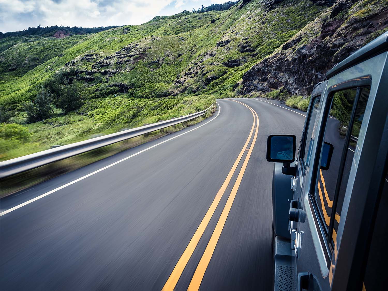 Truck driving through mountain roads