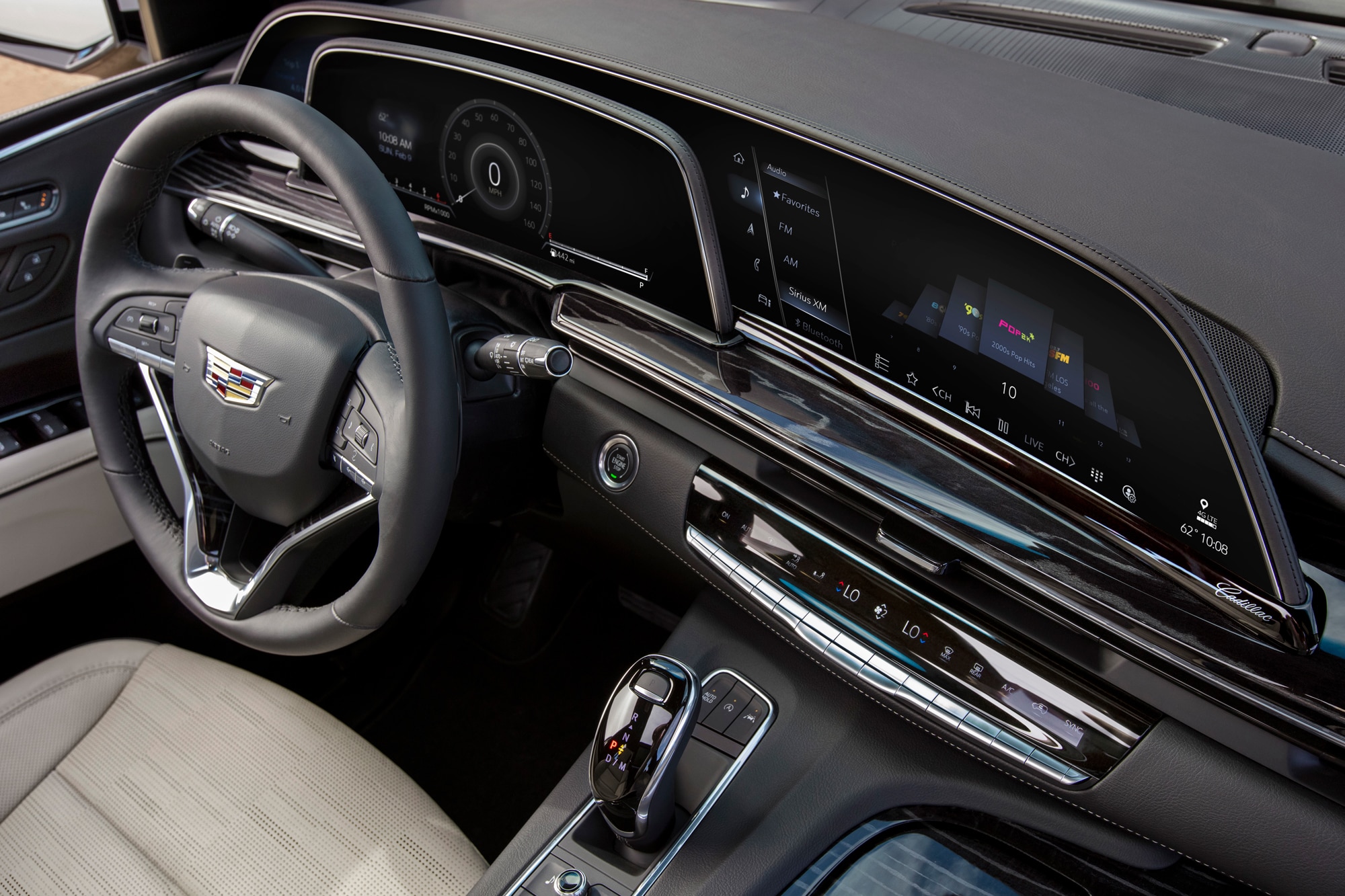 2023 Cadillac Escalade Sport steering and dashboard with cream interior