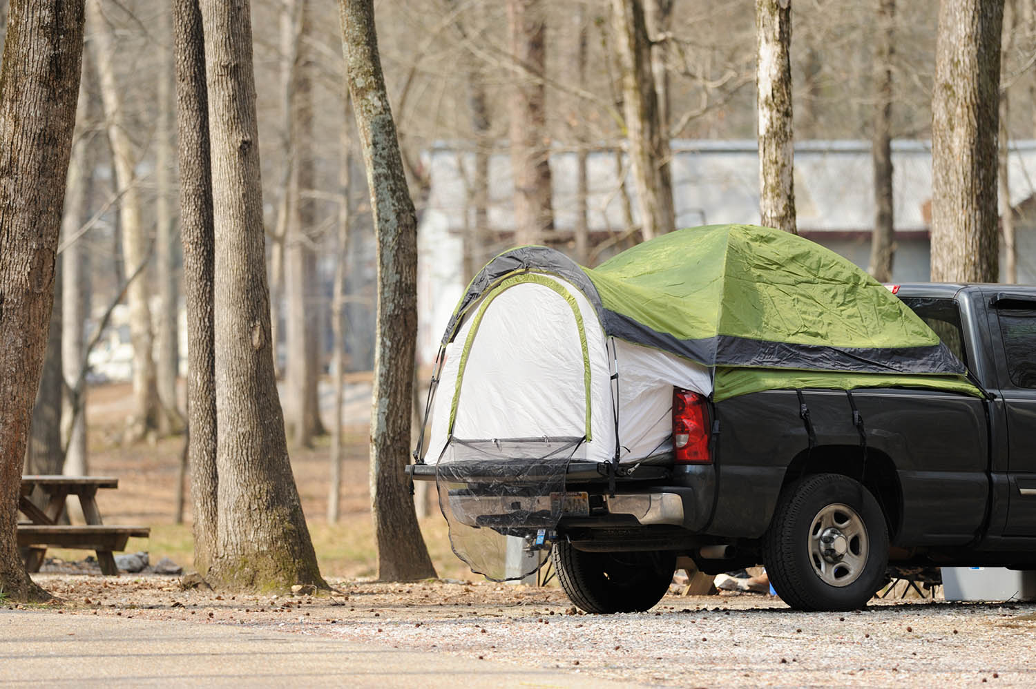 Pickup truck with a tent in its bed