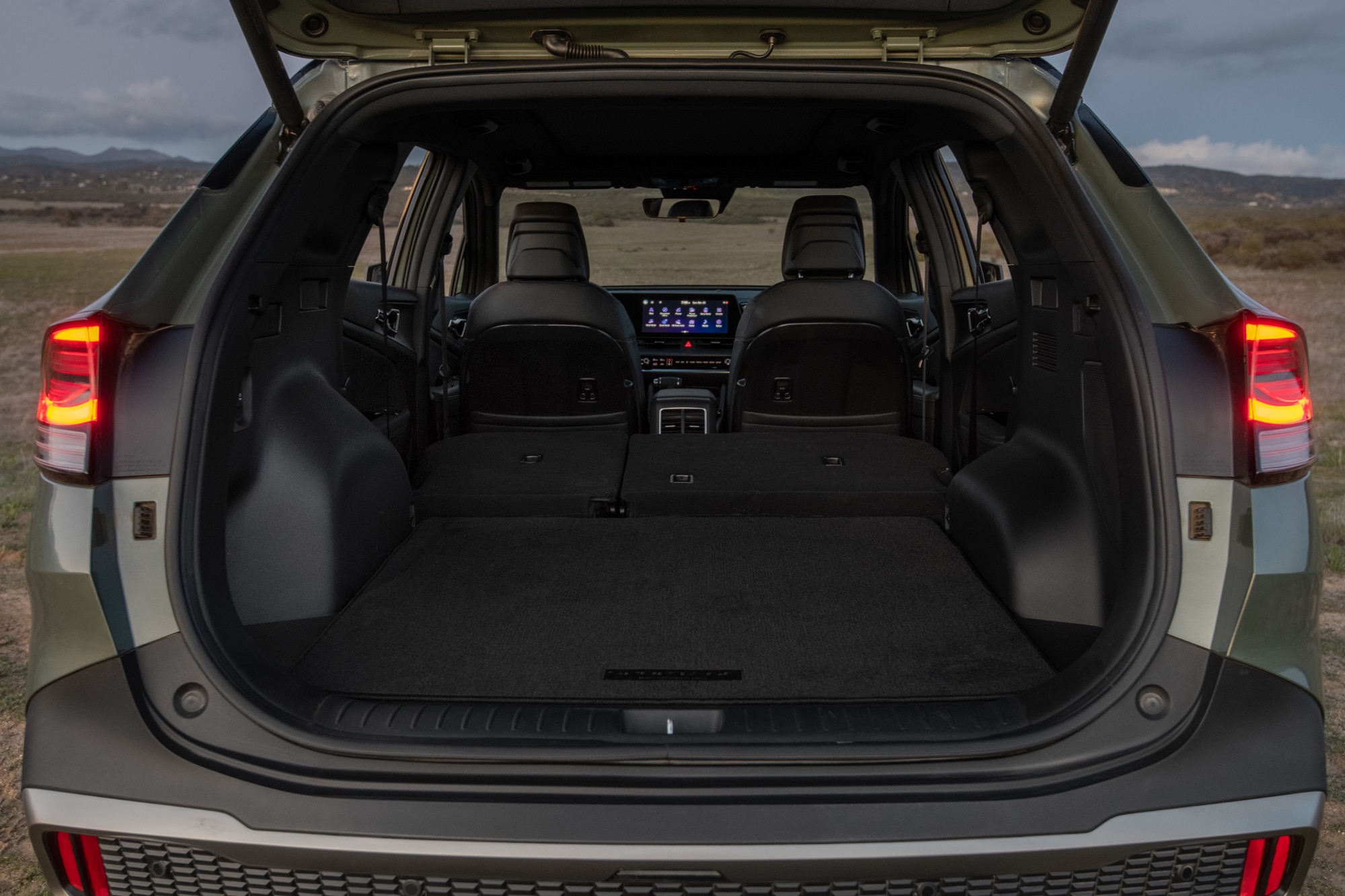 2023 Kia Sportage X-Pro open trunk with seats down