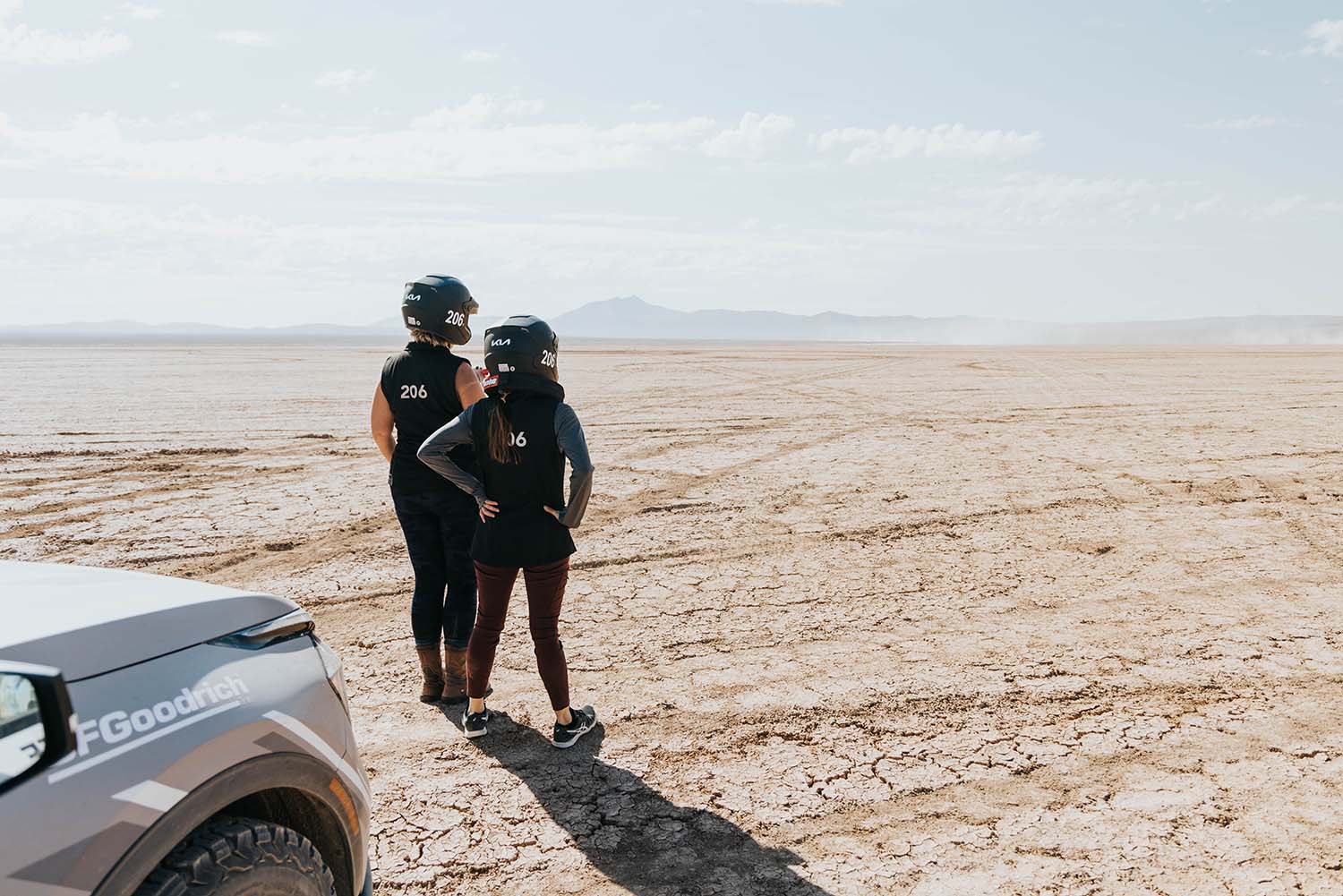 Two Rebelle Rally competitors look out at the desert
