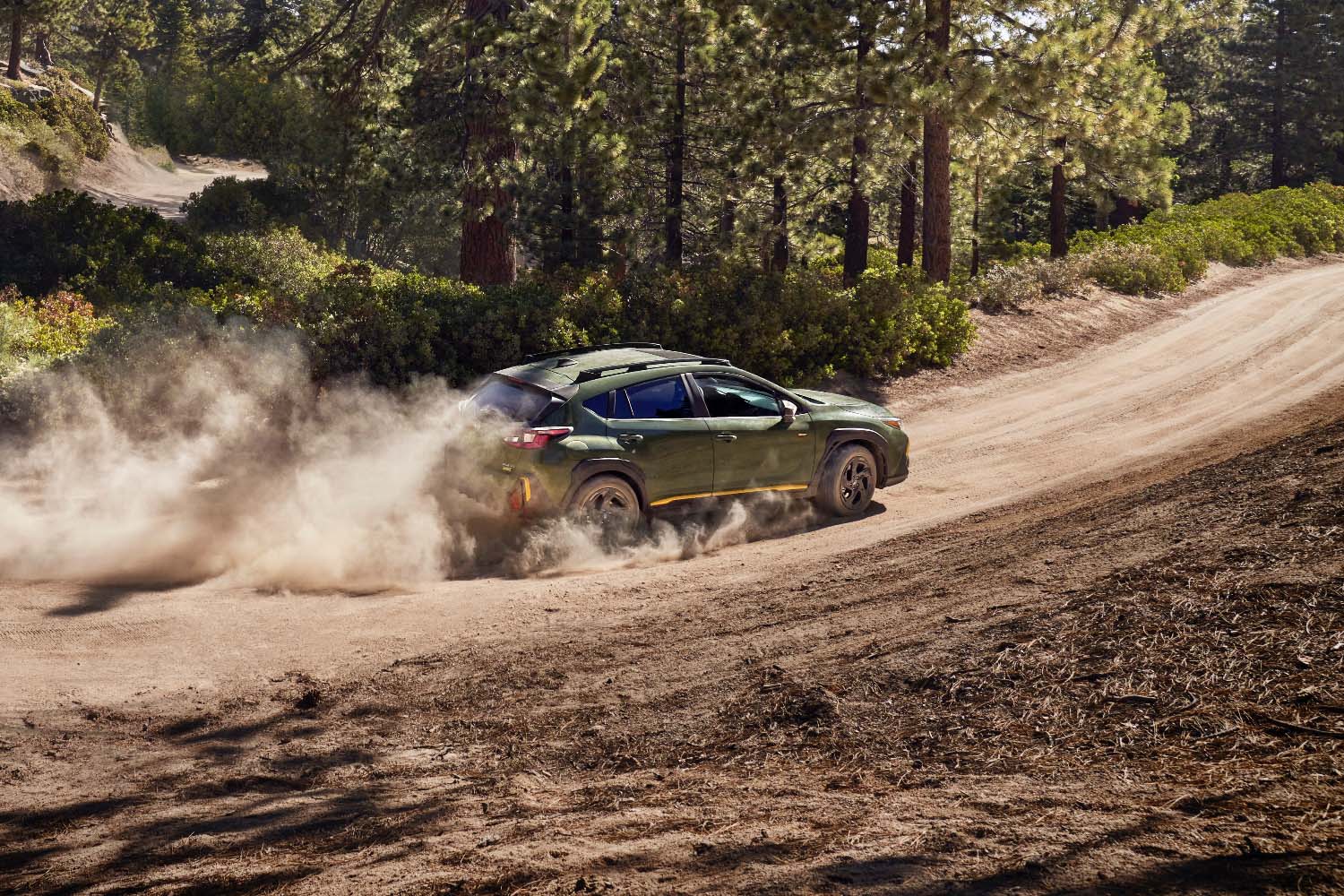 2024 Subaru Crosstrek Sport green front quarter action profile