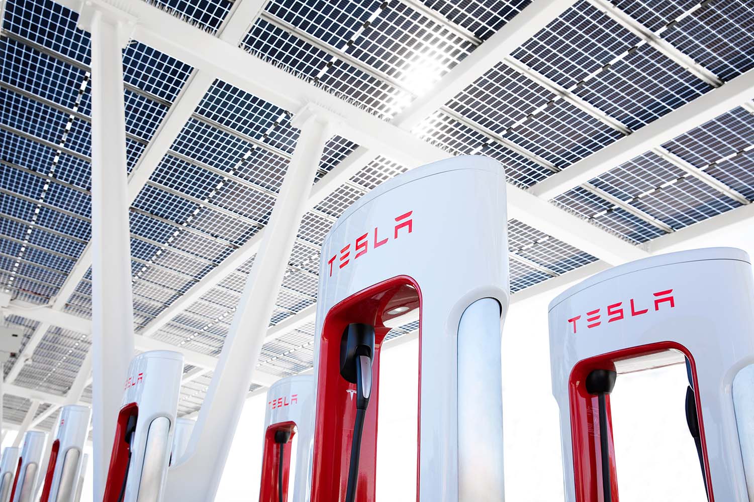 Red and white Tesla EV chargers