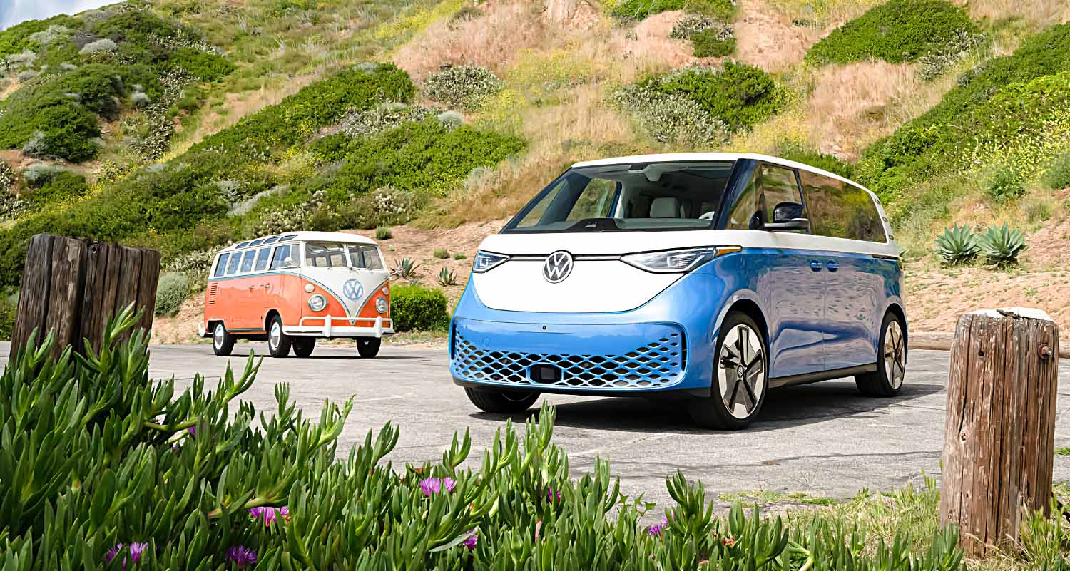2025 Volkswagen ID. Buzz in blue and white with original midcentury VW Microbus in red and white