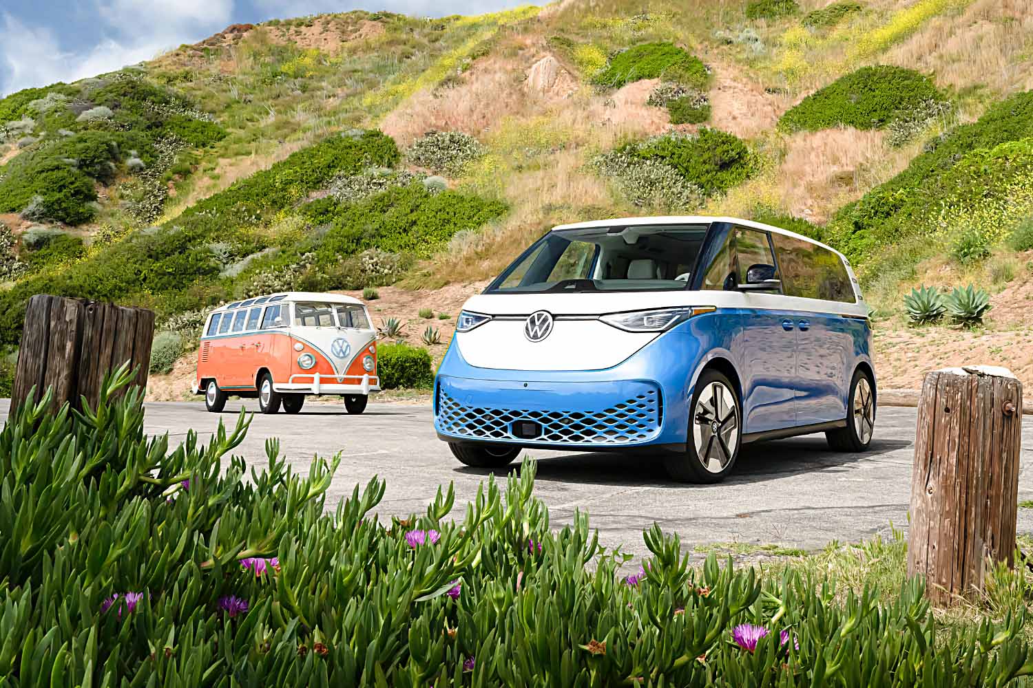 2025 Volkswagen ID. Buzz in blue and white with original midcentury VW Microbus in red and white