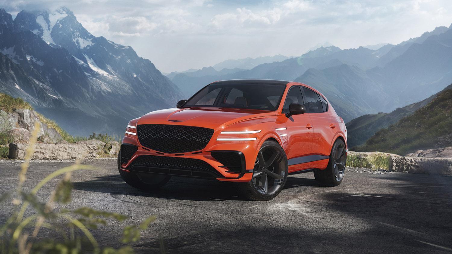 Genesis GV80 Coupe Concept in orange on a picturesque mountain turnout.