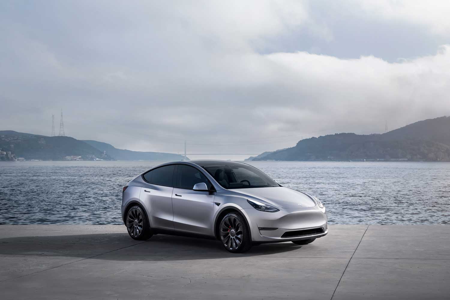 2023 Tesla Model Y Silver front three-quarter