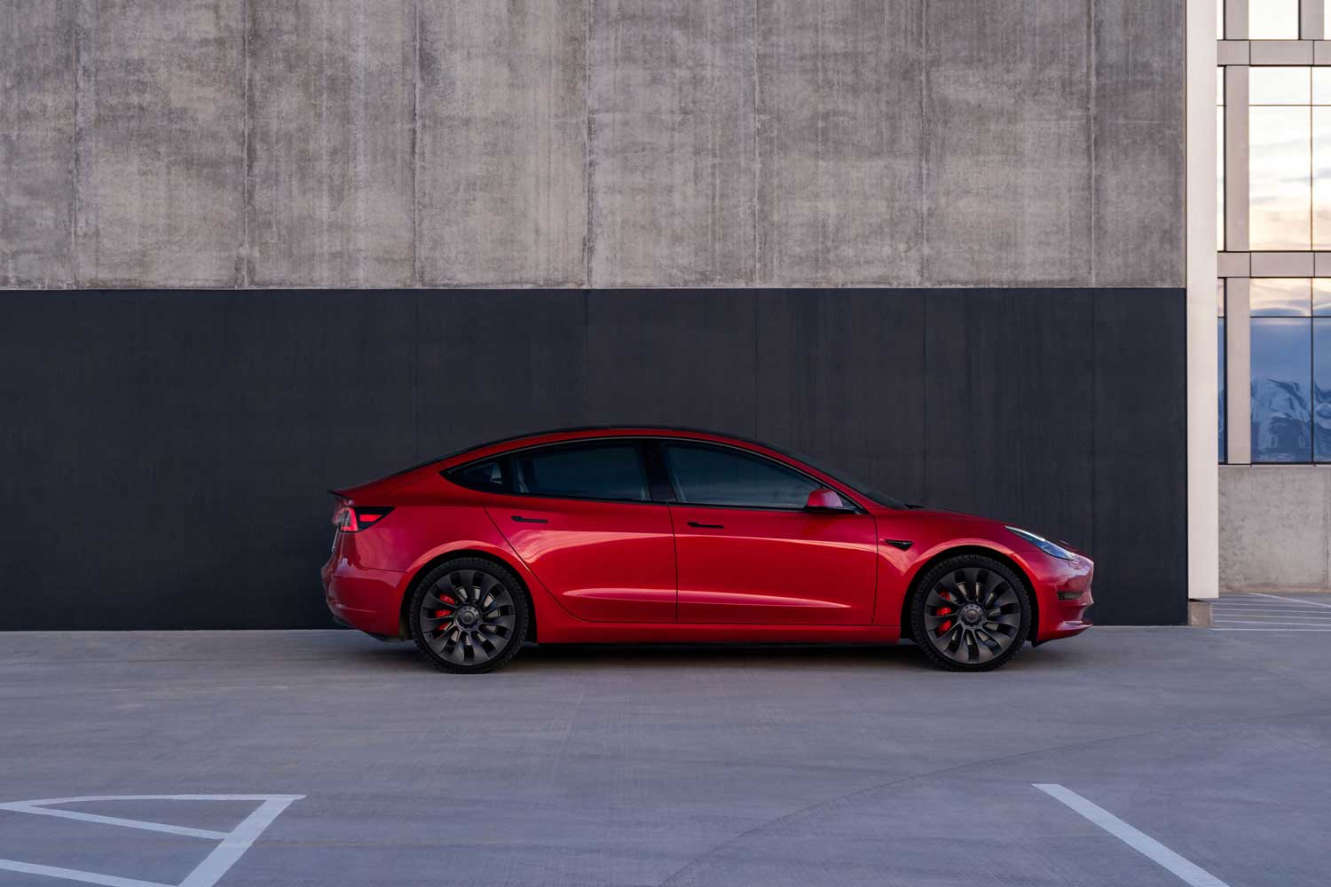 2023 Tesla Model 3 Red side view