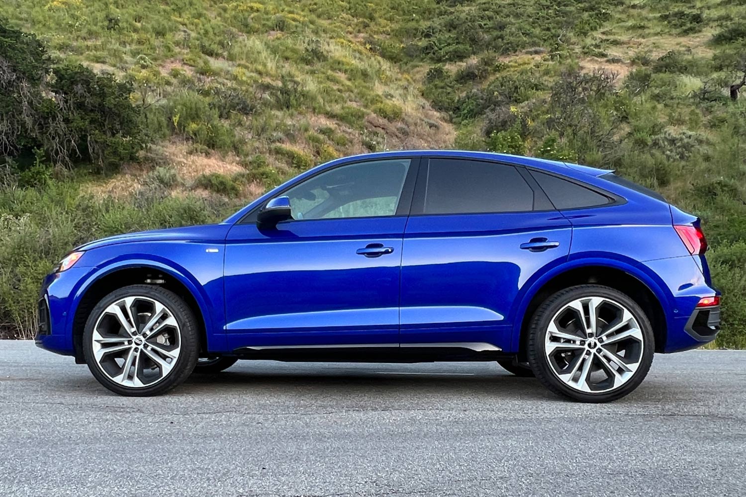 Side view of a blue Audi Q5.