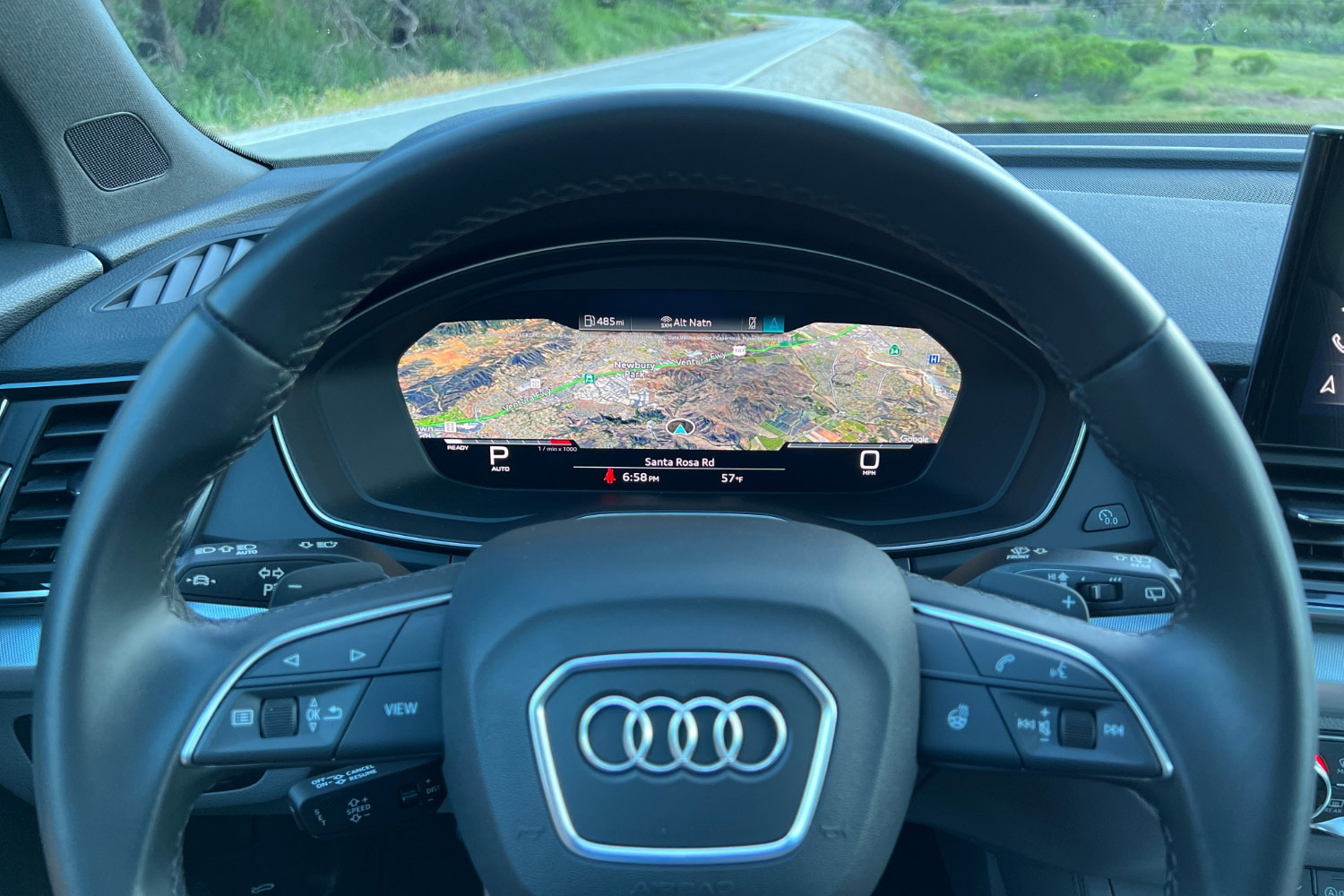 Steering wheel and driver information screen in an Audi Q5.