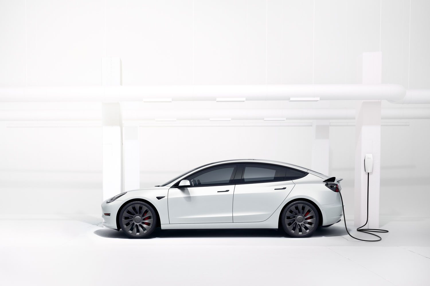 Tesla Model 3 white charging