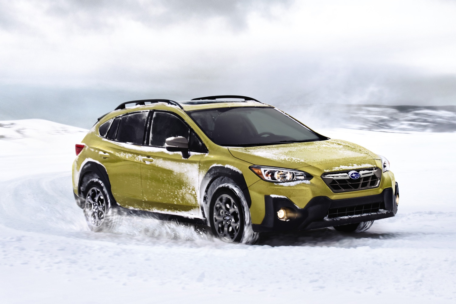 2023 Subaru Crosstrek driving on snow