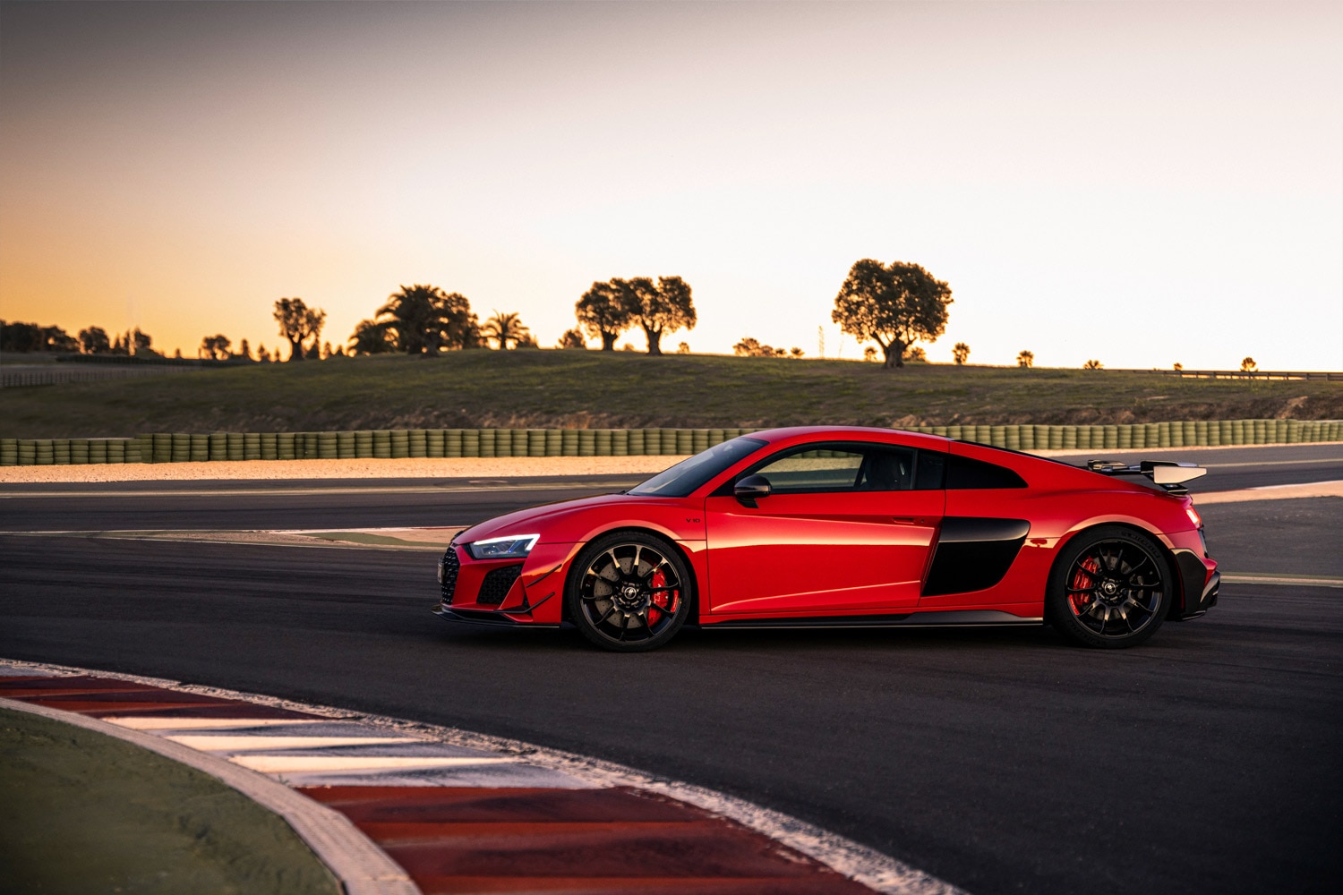 Side view of a red Audi R8 GT