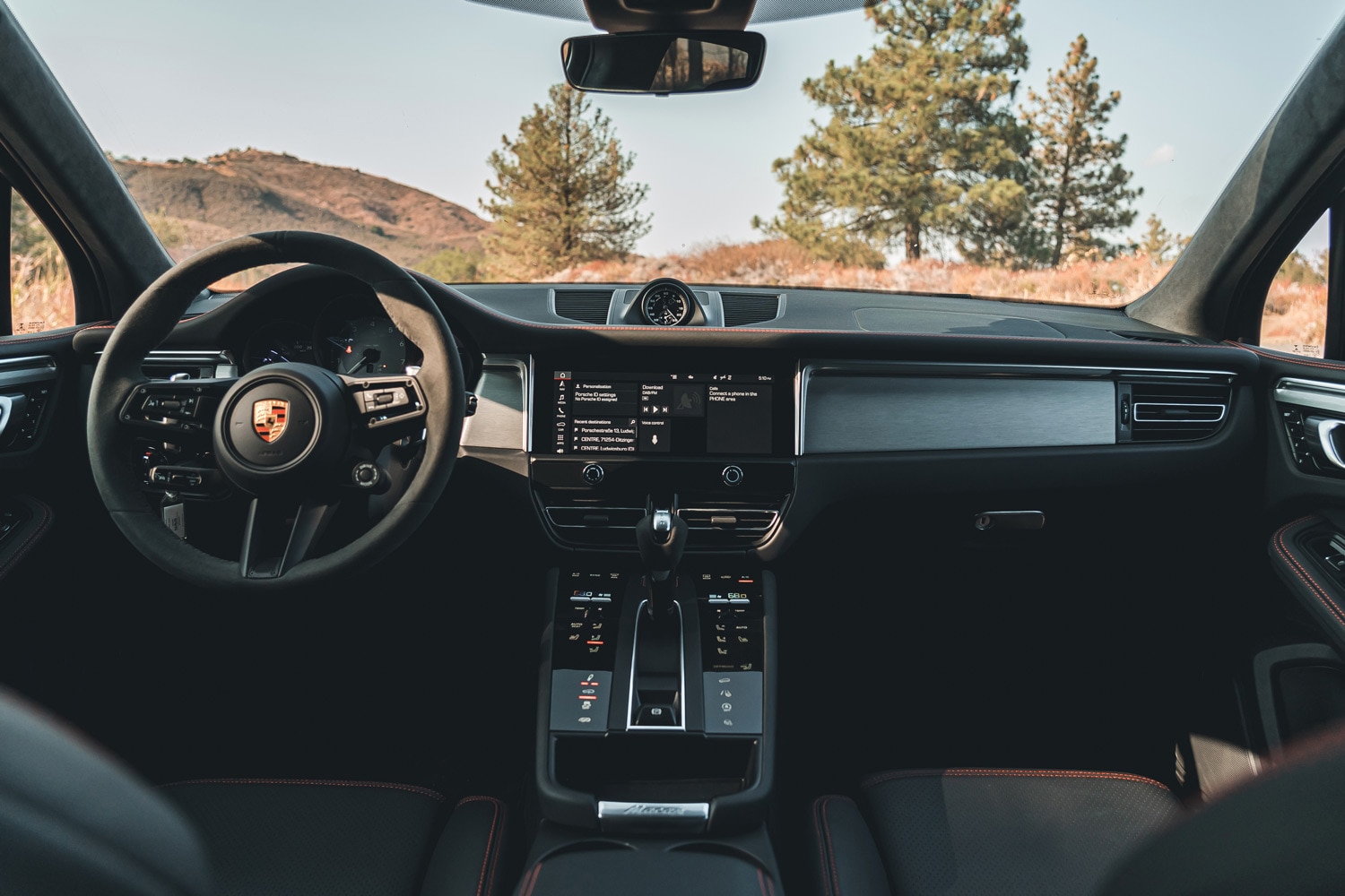 Dash and steering wheel of a 2023 Porsche Macan