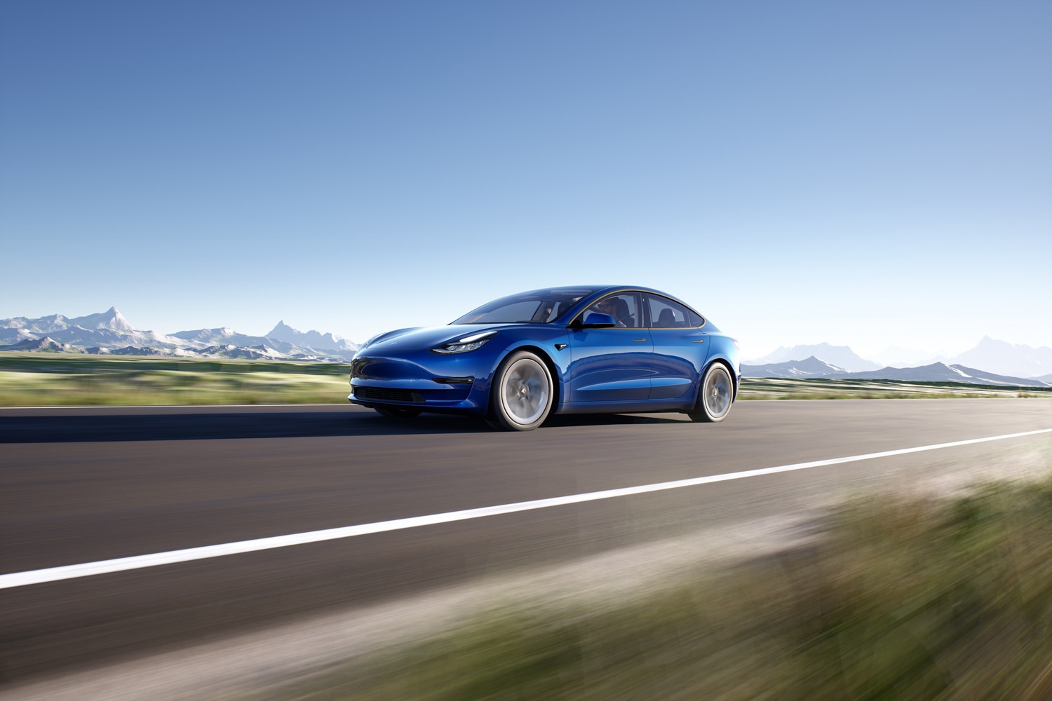 Front three-quarter view of a blue 2023 Tesla Model 3