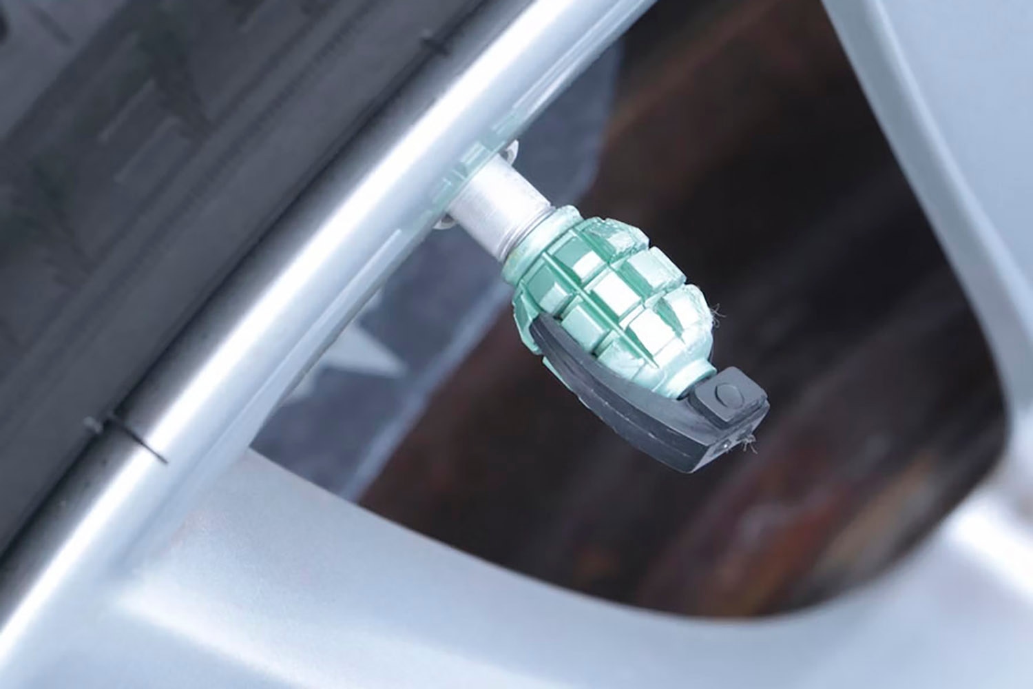 Detail of grenade valve stem cap on Tesla Model S owned by Jack White