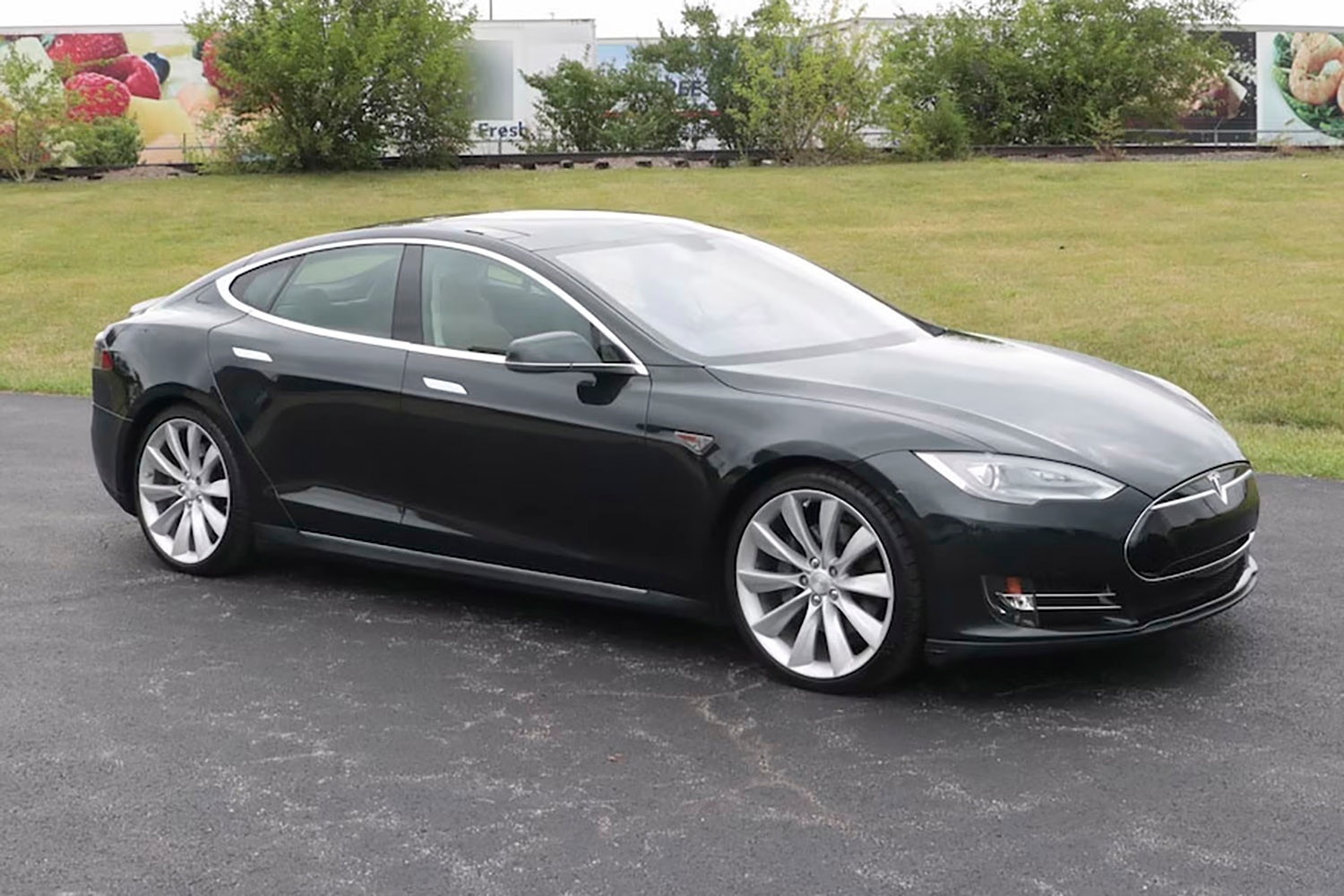 Dark Green Tesla Model S owned by Jack White