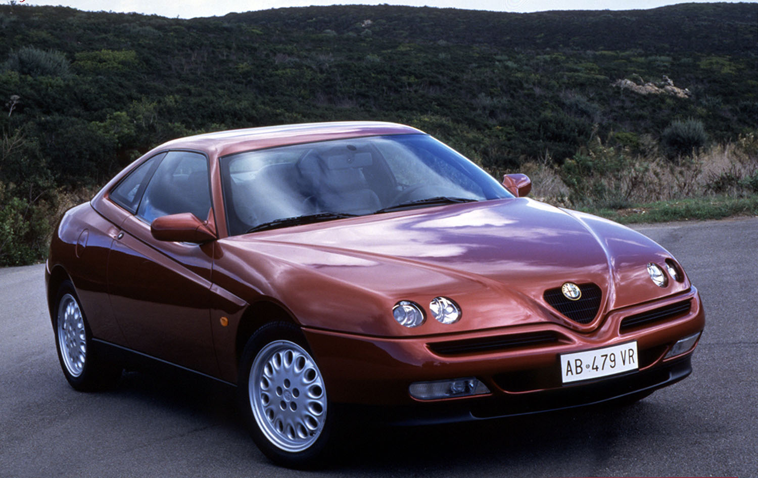 1990s Alfa Romeo GTV in red brown