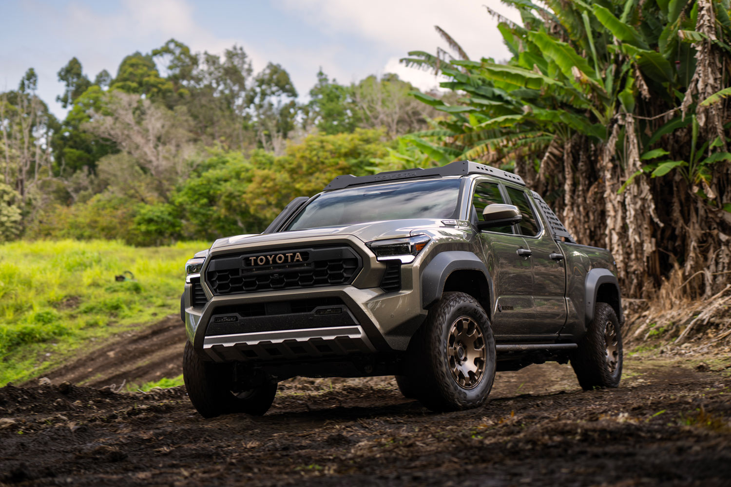 2024 Tacoma Trailhunter parked on dirt in tropical location