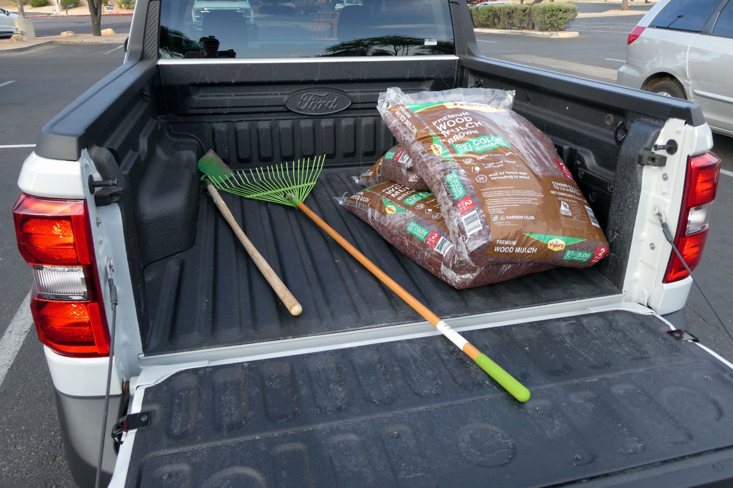 2023 Ford Maverick Tremor bed with mulch and garden tools