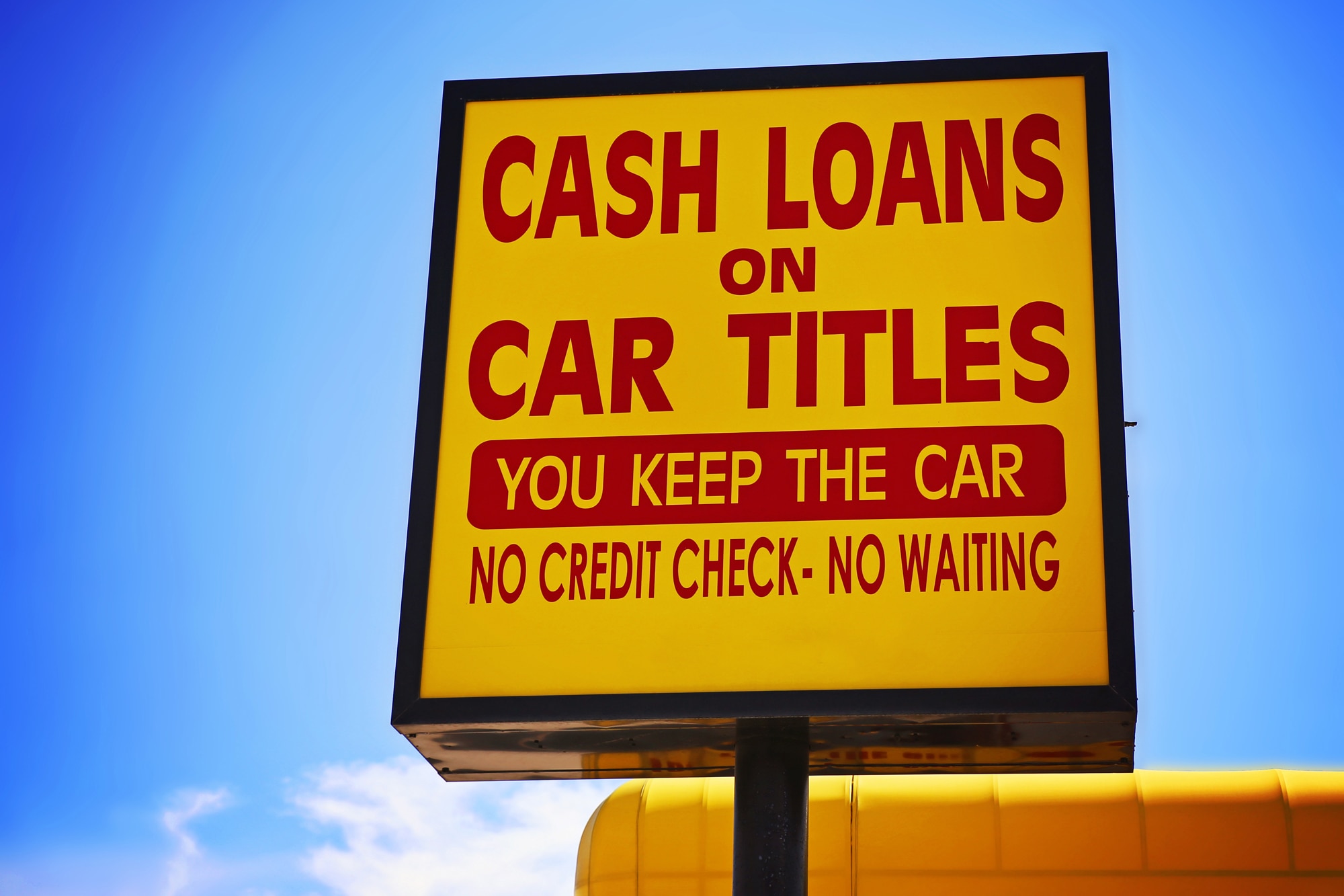 Cash loan on car title sign