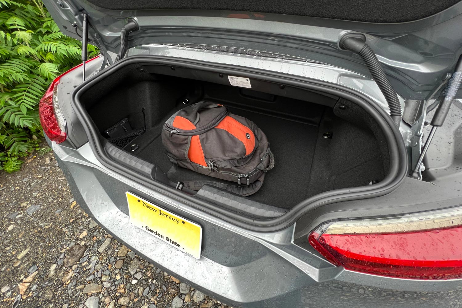The trunk space of a silver 2024 BMW Z4