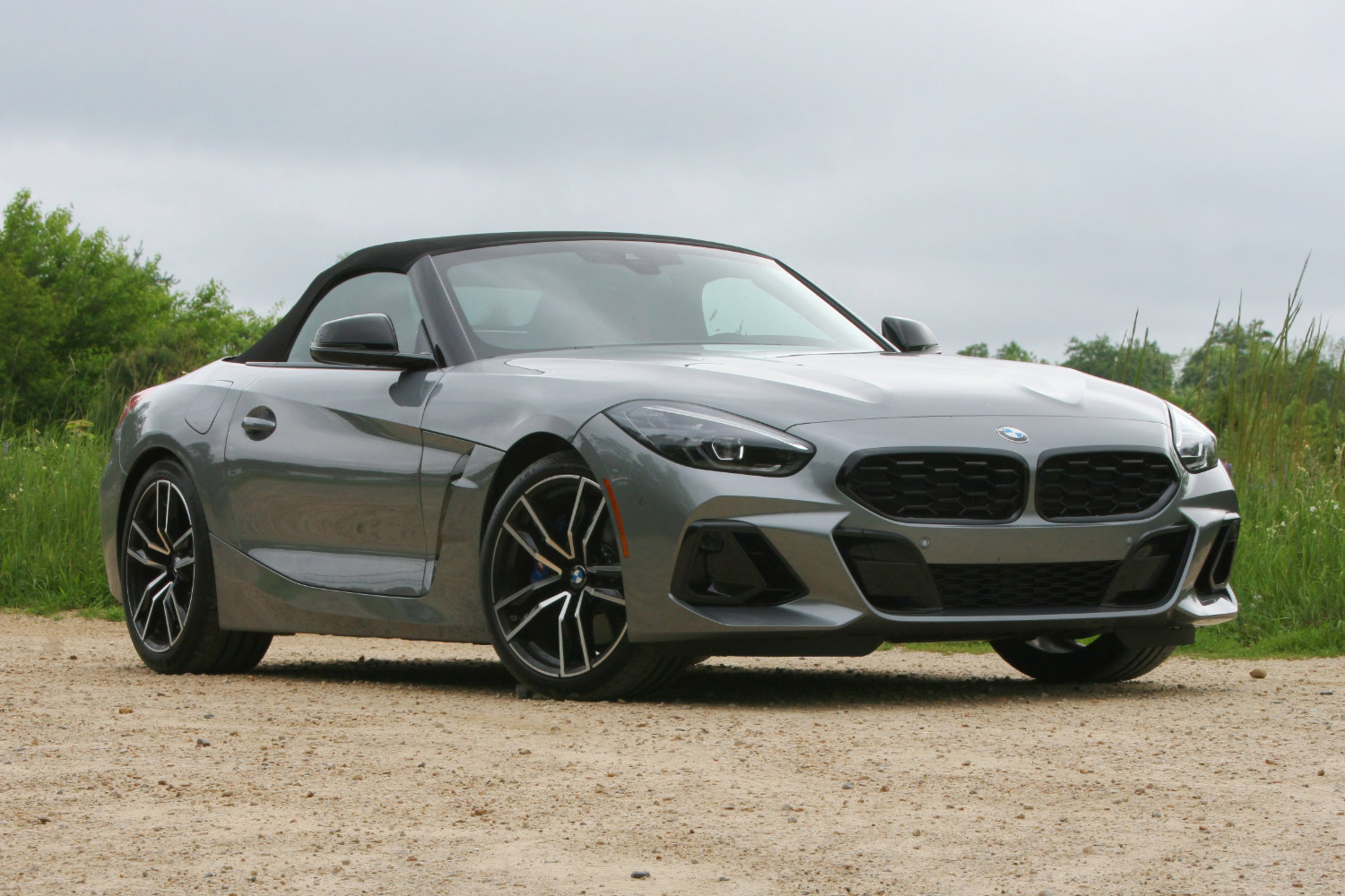 Front three-quarter view of a silver 2024 BMW Z4 with the top up