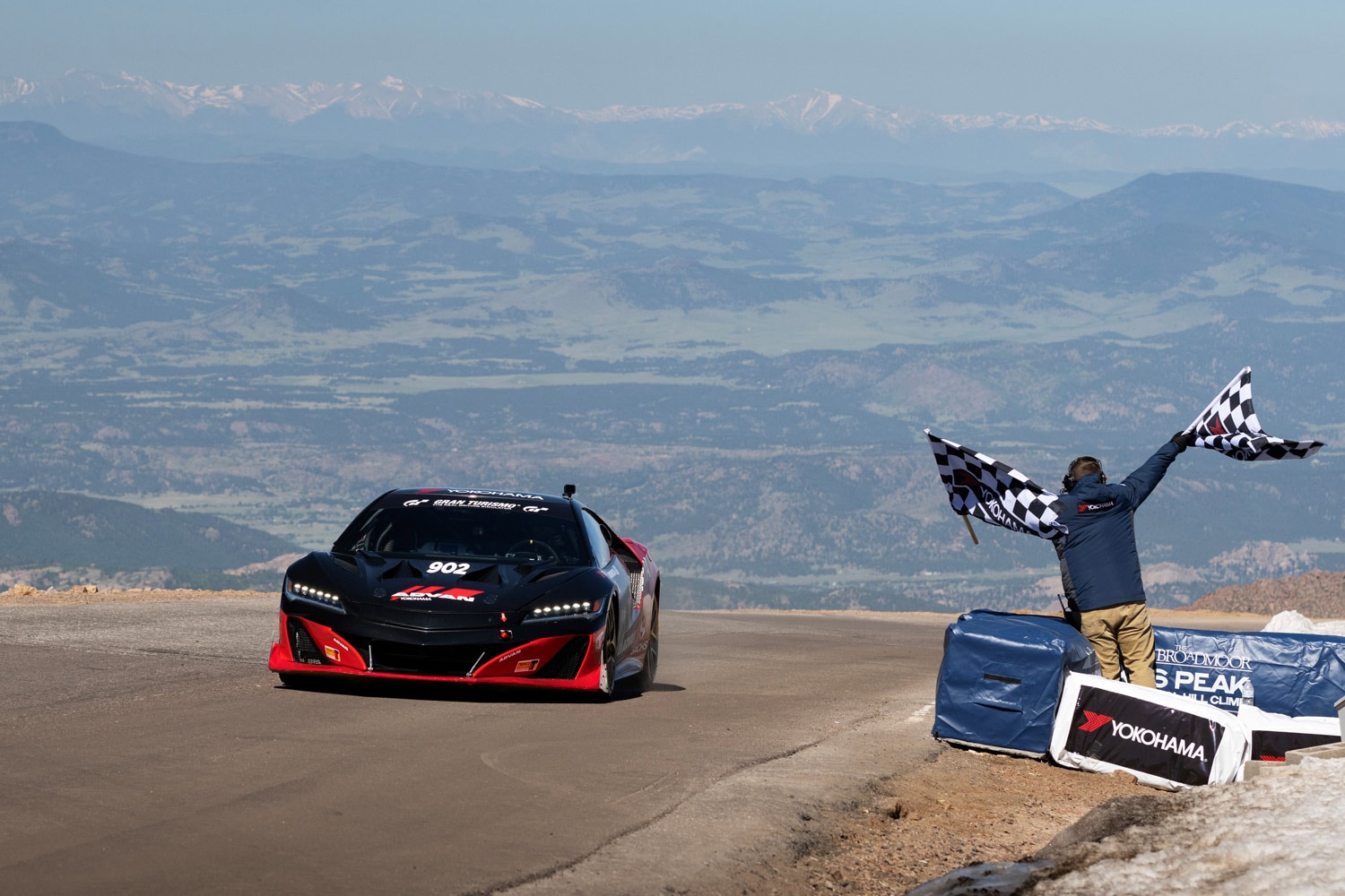 A black Acura NSX crosses the finish line at the summit of Pikes Peak