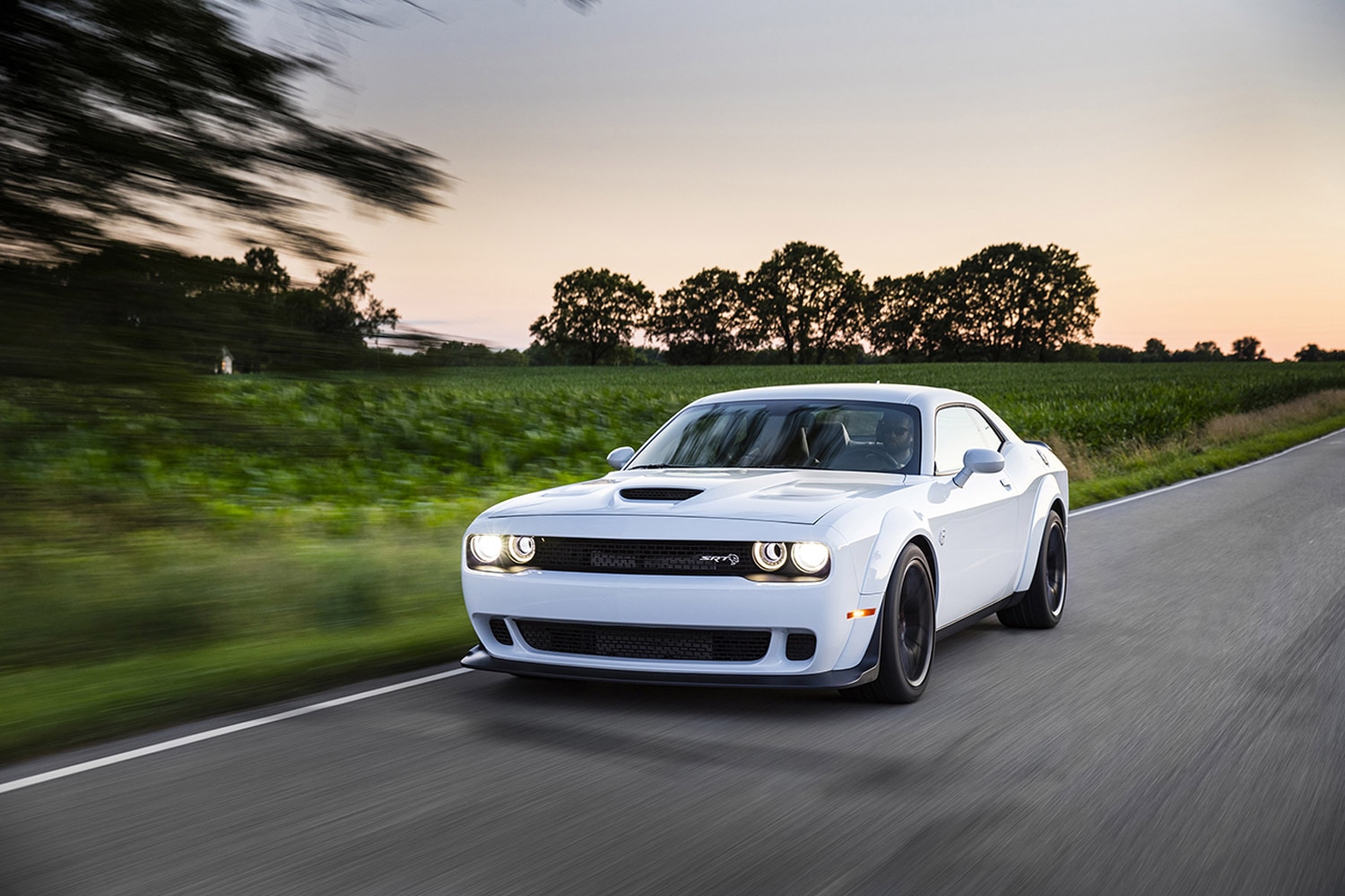 Front three-quarter view of a white Dodge Challenger