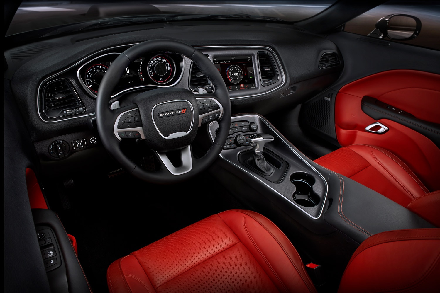 Red and black front seats and dashboard of a Dodge Challenger