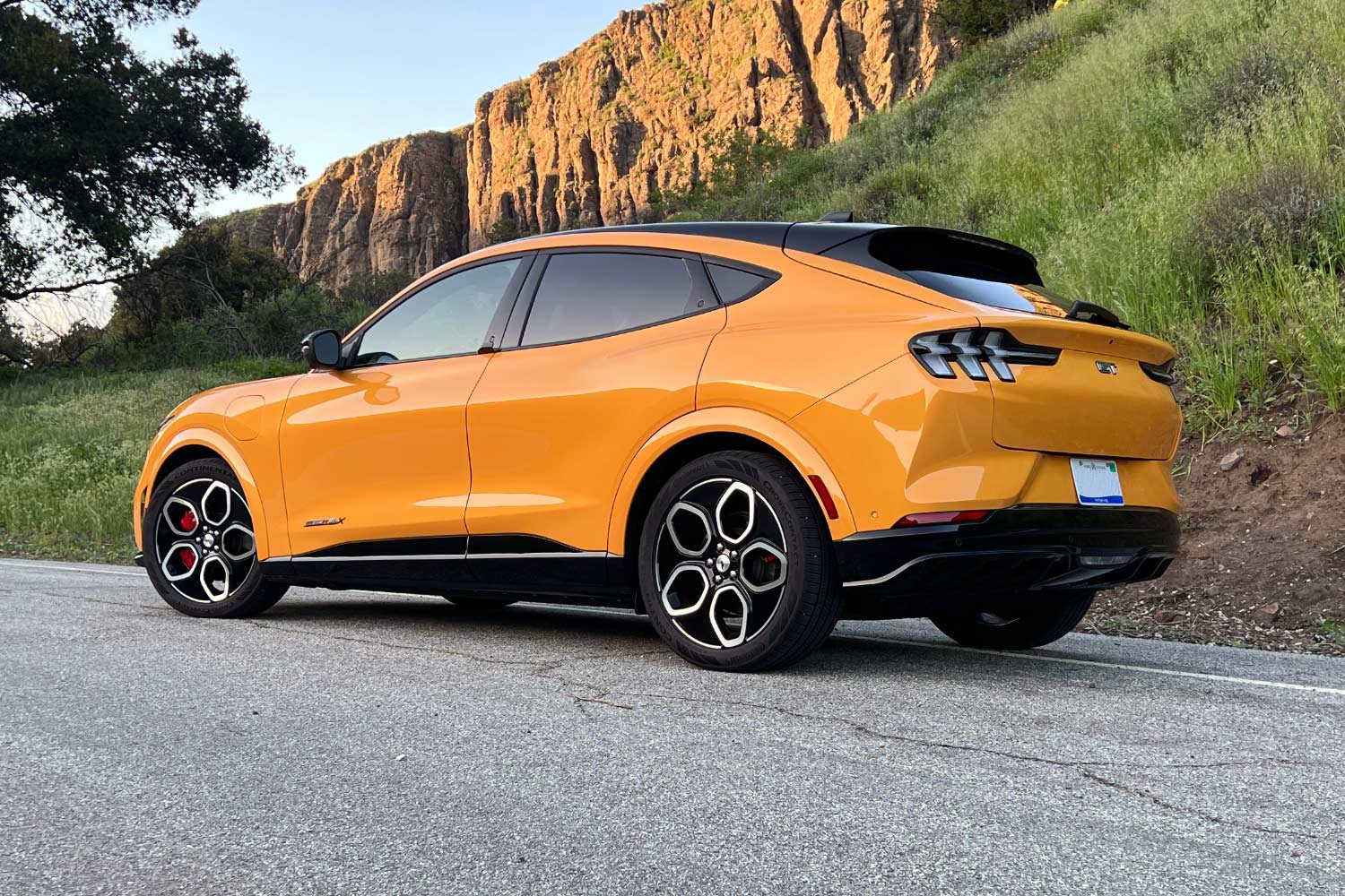 2023 Ford Mustang Mach-E GT in Cyber Orange rear view