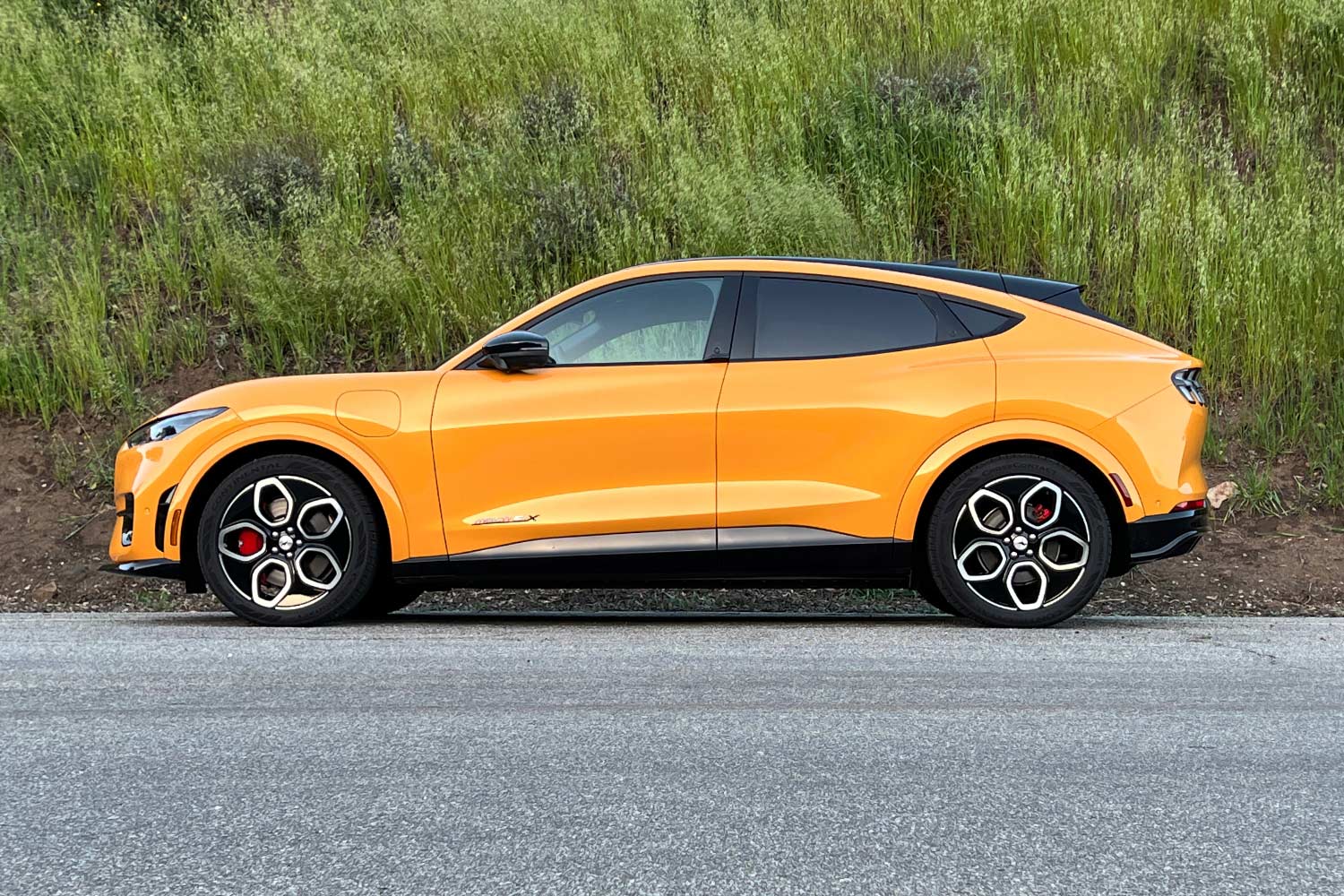 2023 Ford Mustang Mach-E GT in Cyber Orange side view
