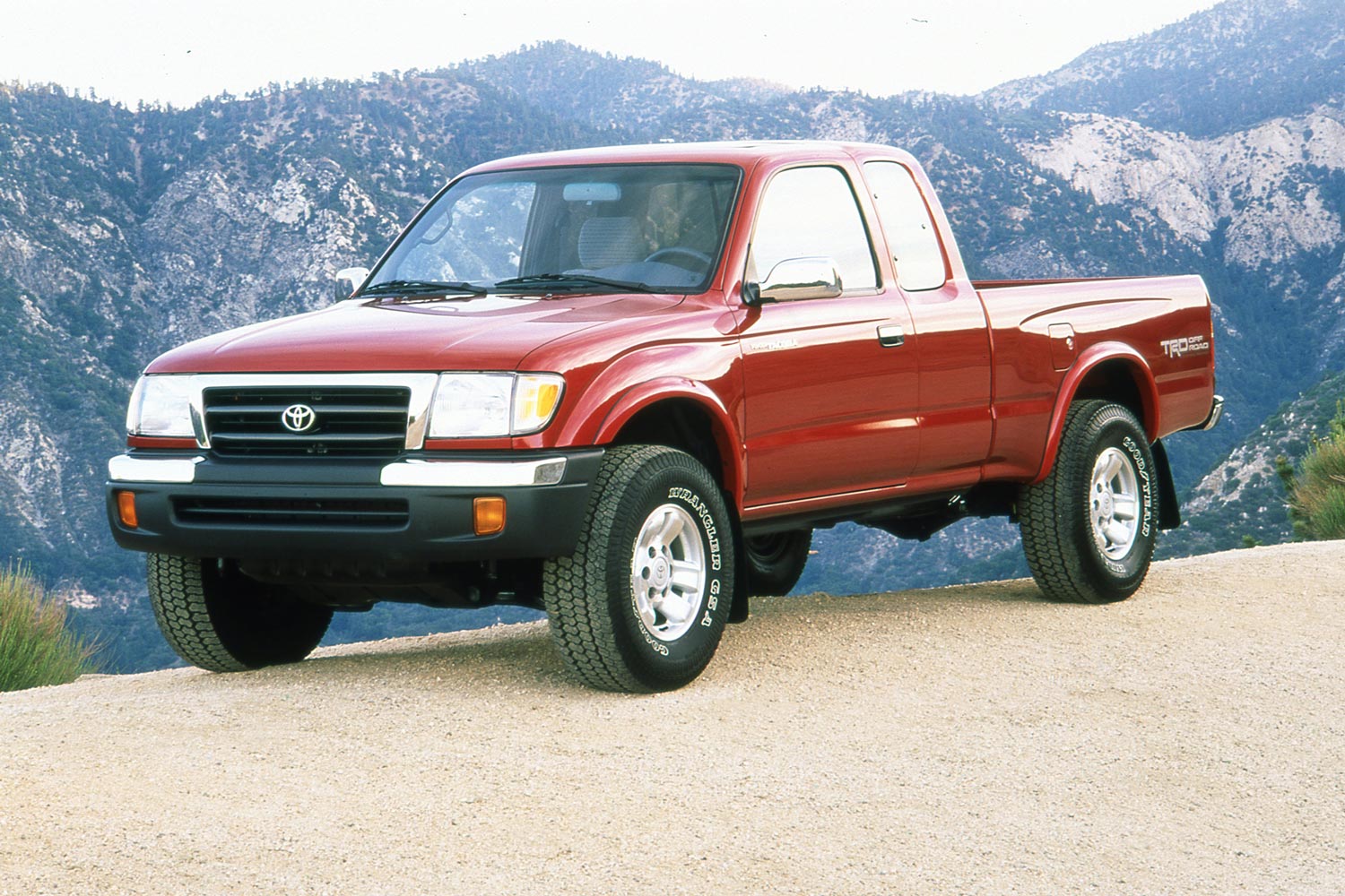 Front three-quarter view of a red 1998 Toyota Tacoma TRD