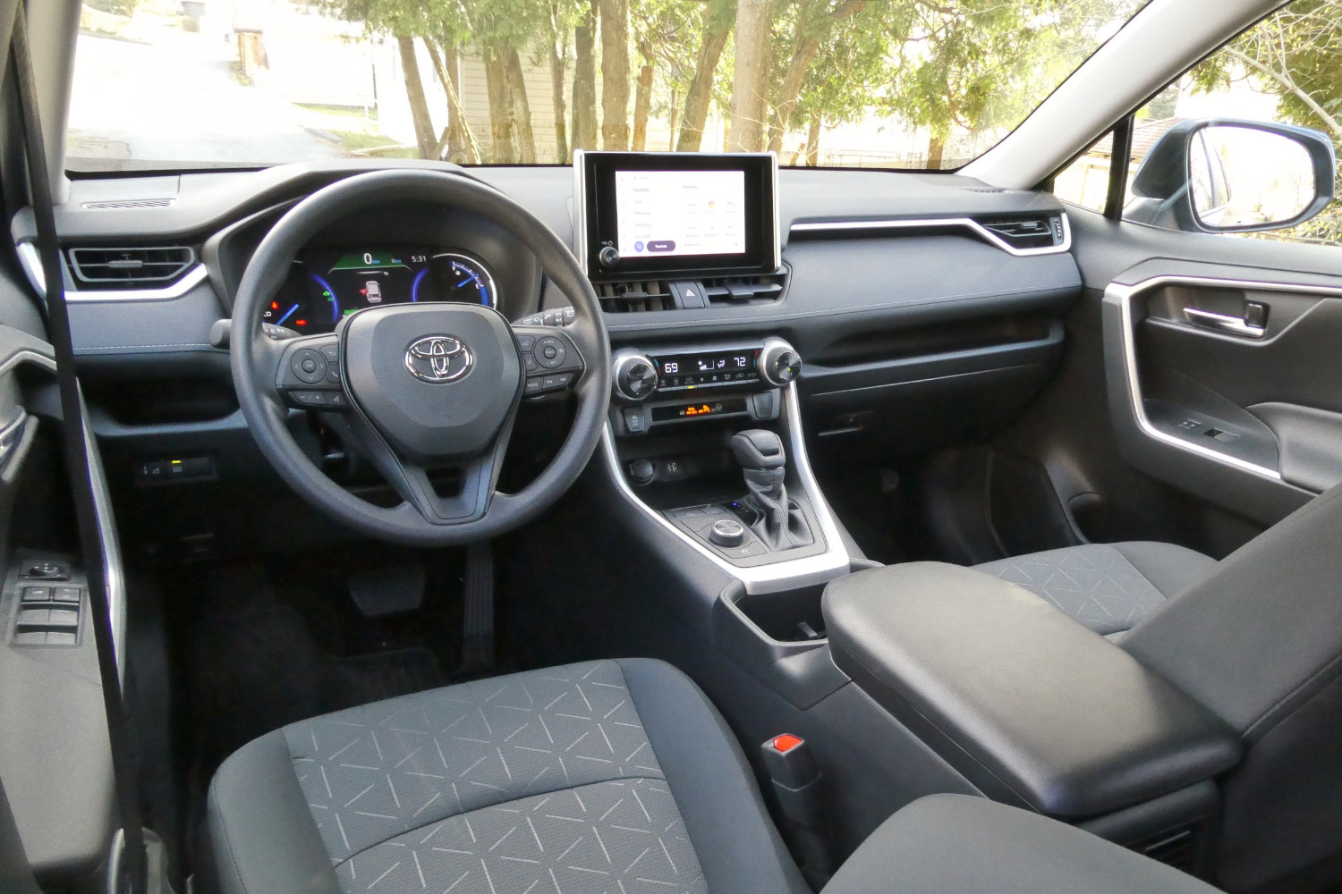 2023 Toyota RAV4 Hybrid Woodland Edition interior and steering wheel