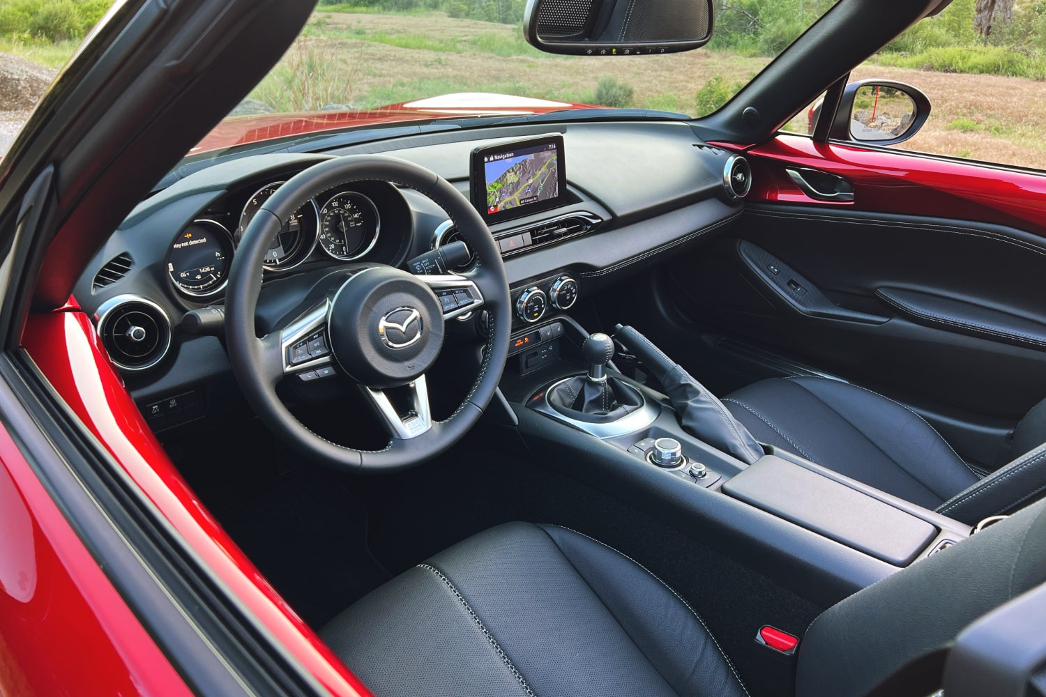 2023 Mazda MX-5 Miata Grand Touring interior, dashboard, and front seats