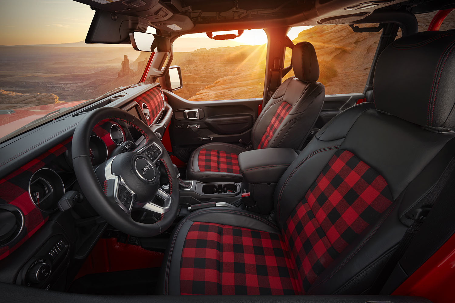 Jeep Gladiator front seat interior with black Katzkin seats of black leather and red-and-black plaid