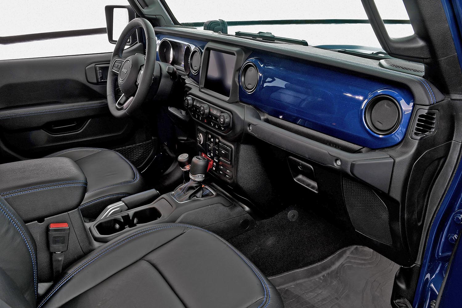 Jeep Gladiator Top Dog interior with black Katzkin leather seats with blue stitching